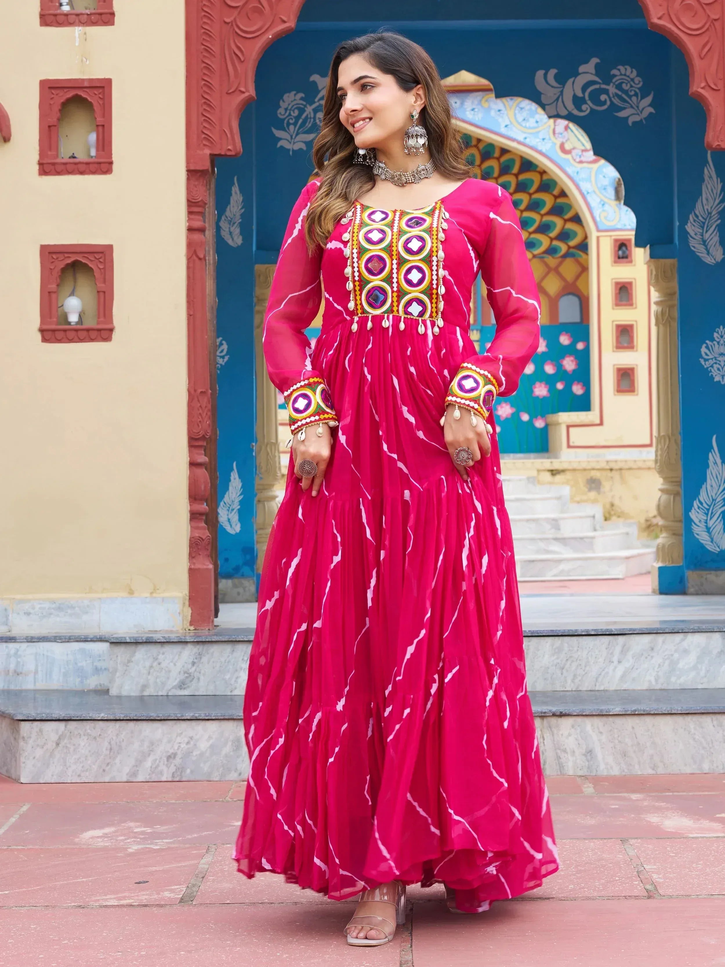 Pink ethnic gown with mirror work and embroidery, perfect for Indian festivals and occasions