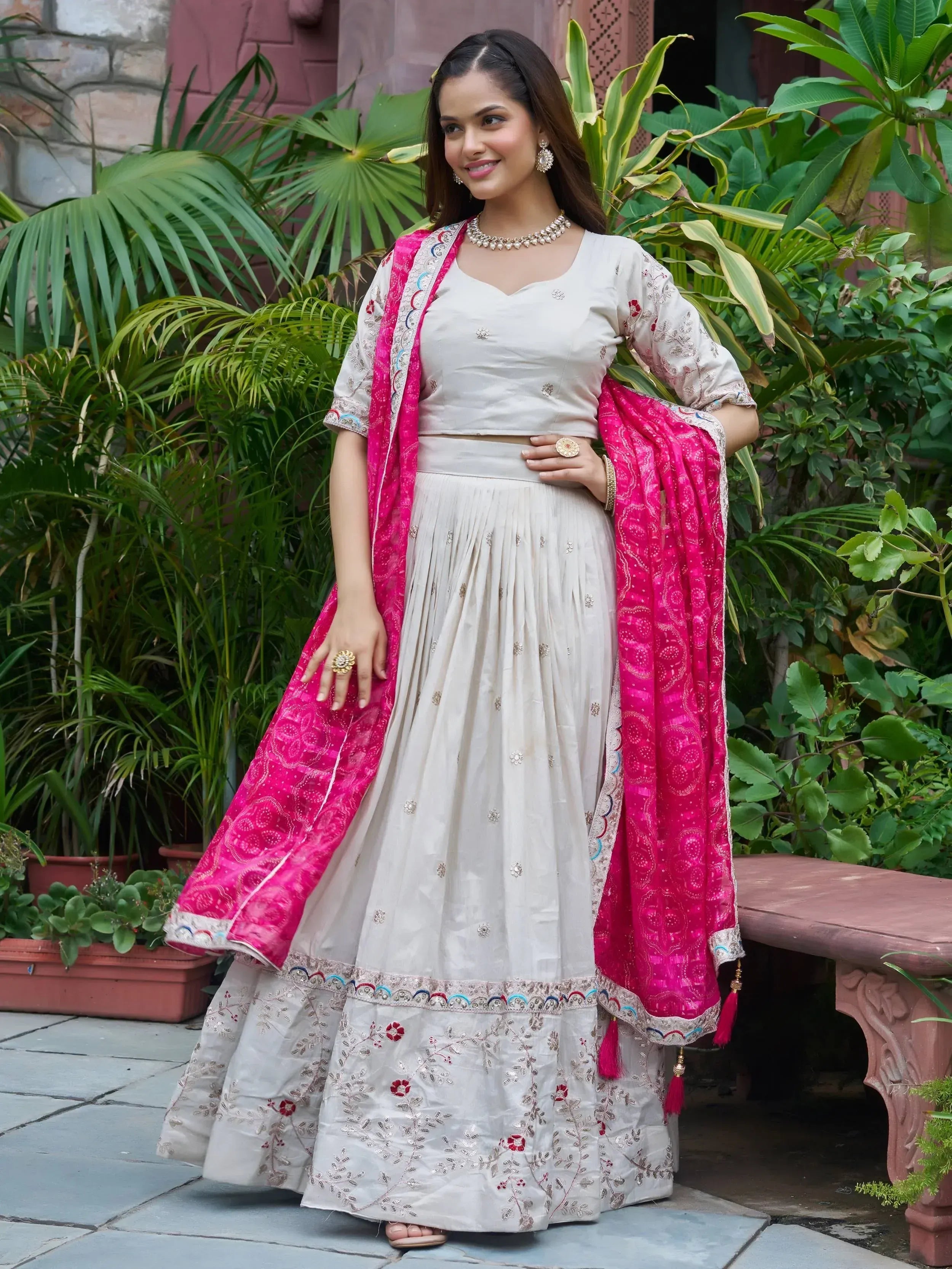 Amazing White Embroidered Silk Lehenga Choli With Pink Dupatta