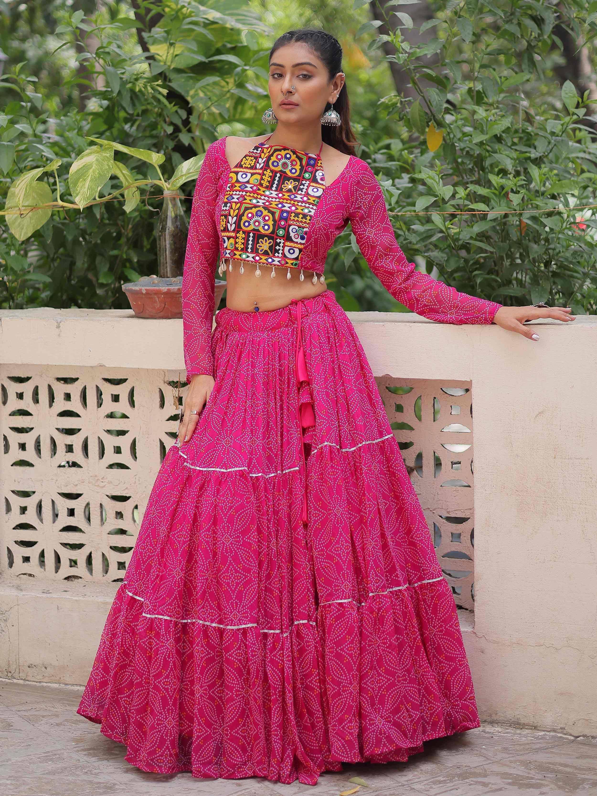 Pink embroidered lehenga choli with mirror work, perfect for Indian ethnic wear and festive occasions