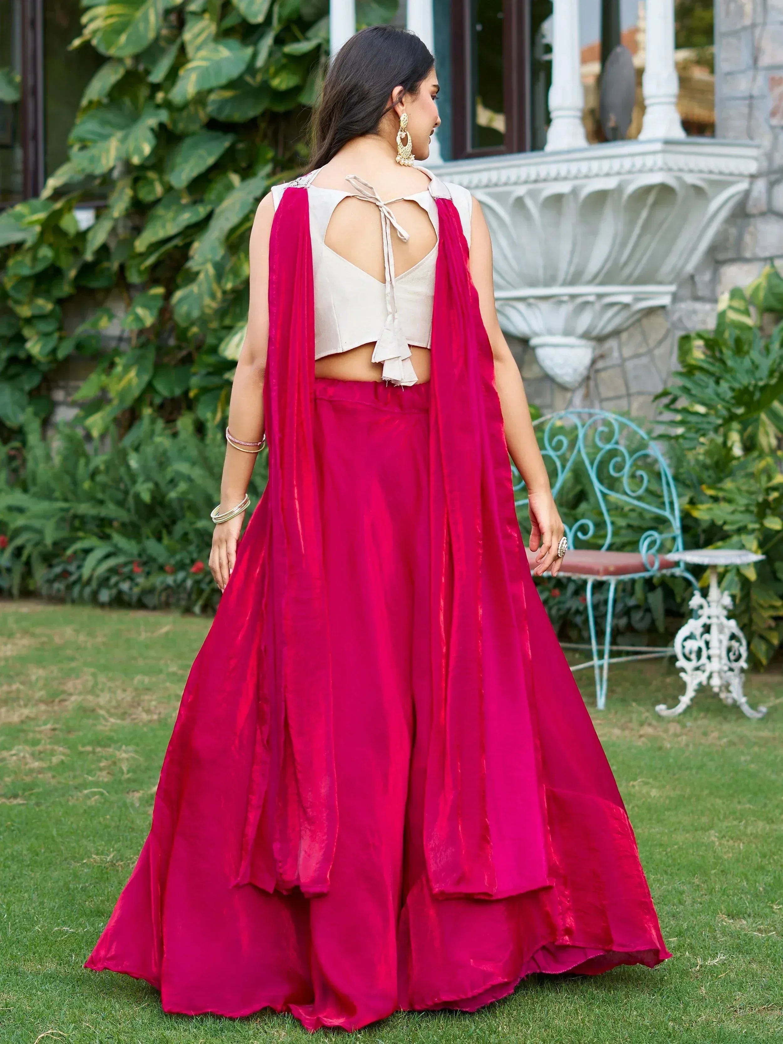 Vibrant pink lehenga choli with back tie blouse, perfect for Indian ethnic wear events