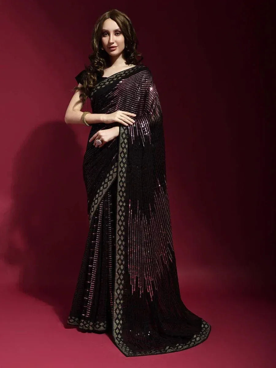 Black sequined saree with pink shimmer and geometric border, elegant Indian ethnic wear