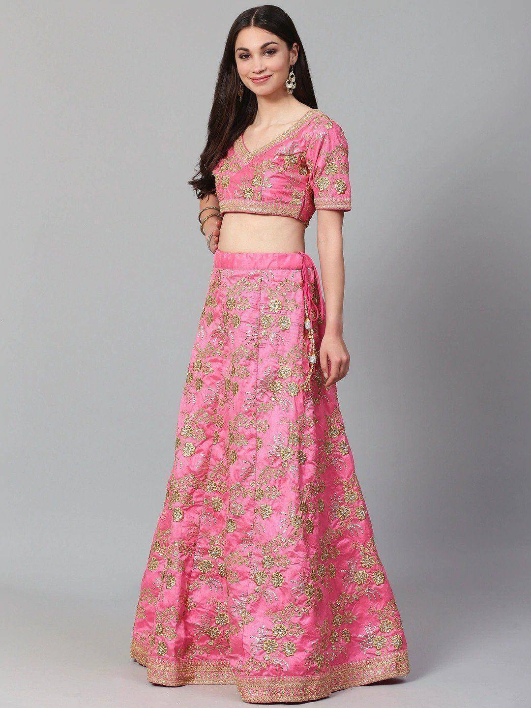 Pink embroidered lehenga choli with gold floral work, perfect for Indian ethnic occasions
