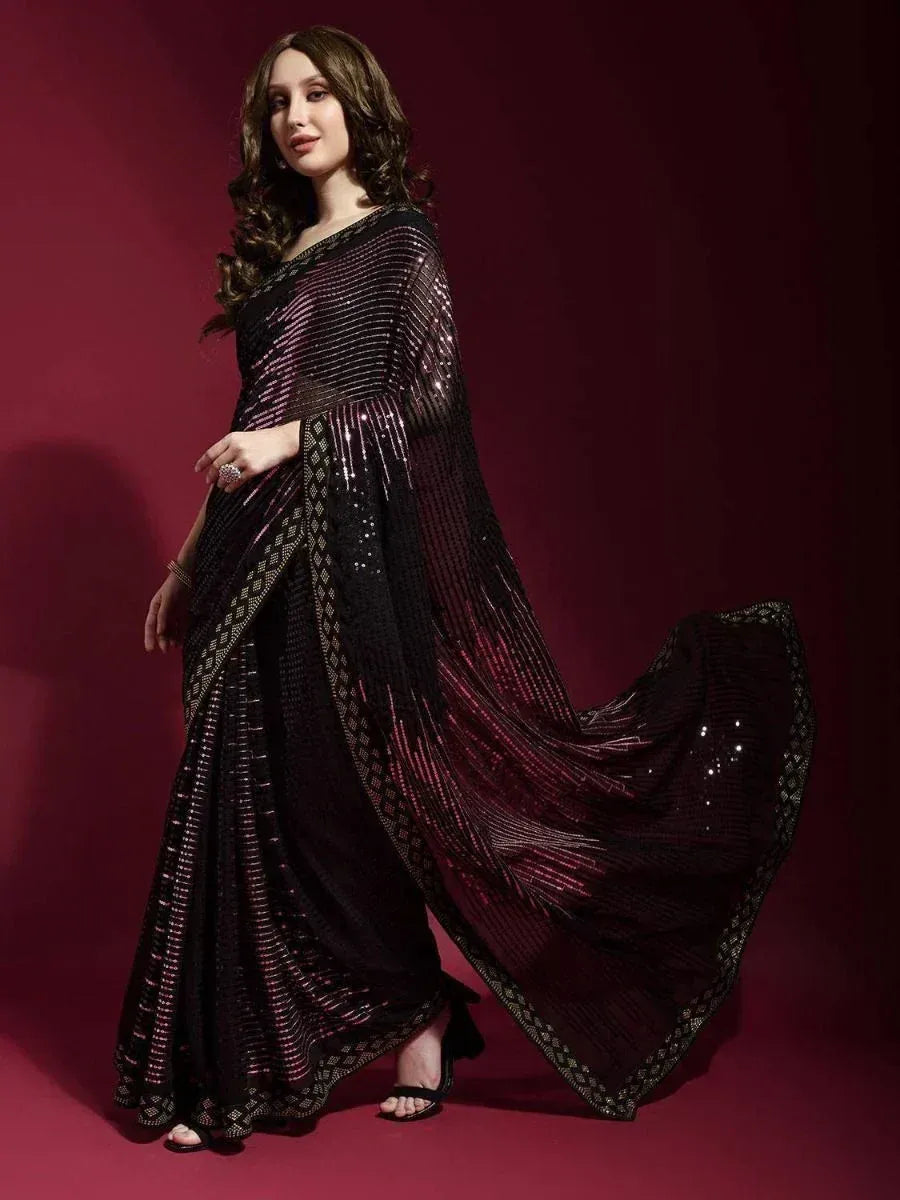 Black sequin saree with shimmering stripes and geometric border, perfect for Indian ethnic occasions