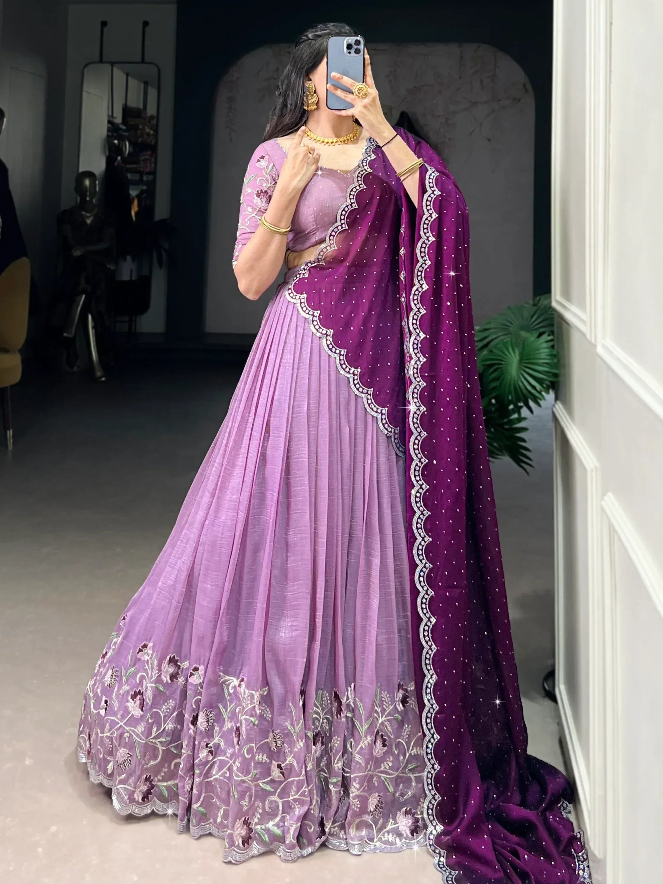 Purple embroidered lehenga choli with matching dupatta, perfect for Indian ethnic occasions and weddings.