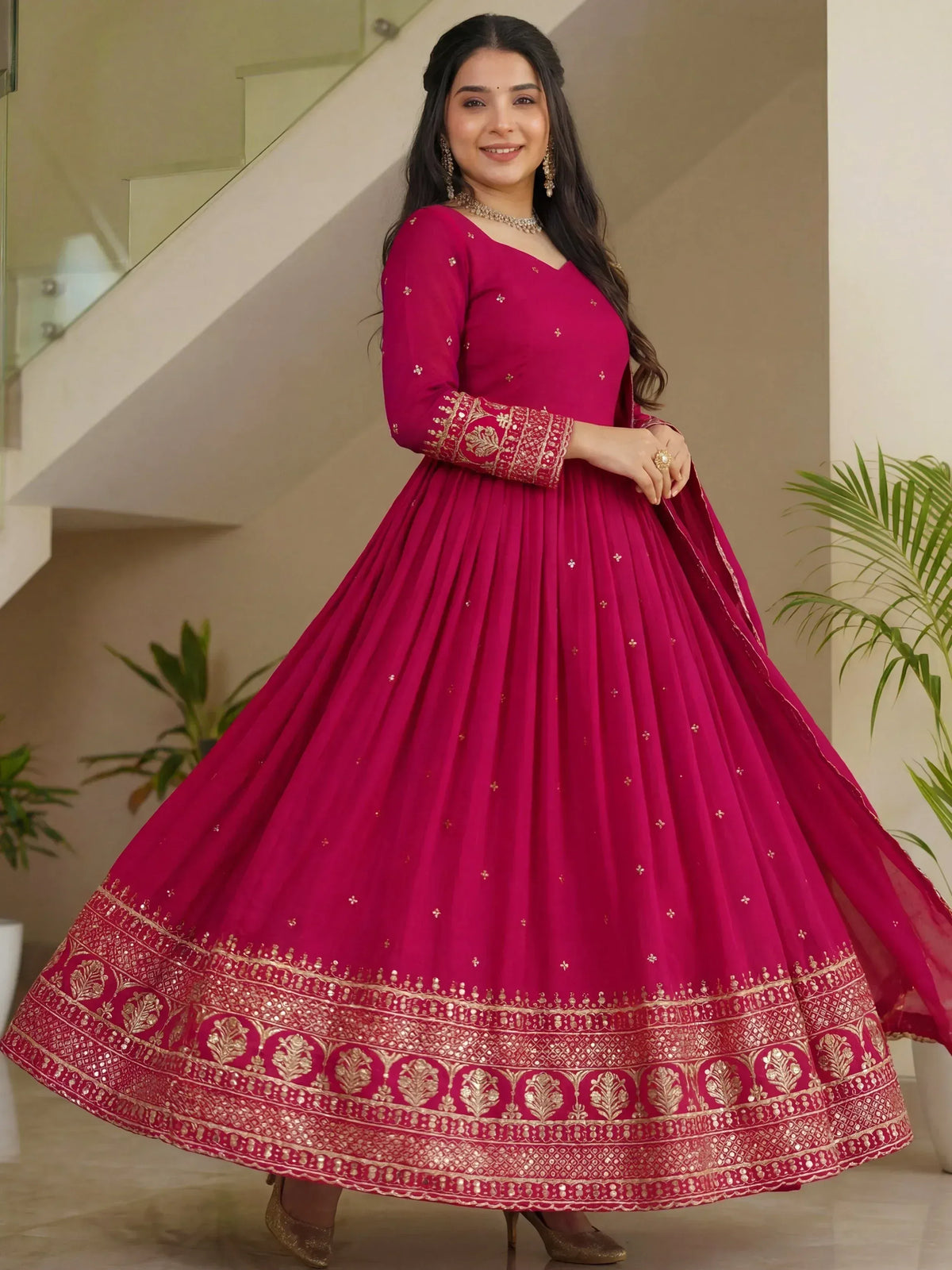 Magenta designer anarkali with gold embroidery, perfect for Indian ethnic wear and festive occasions