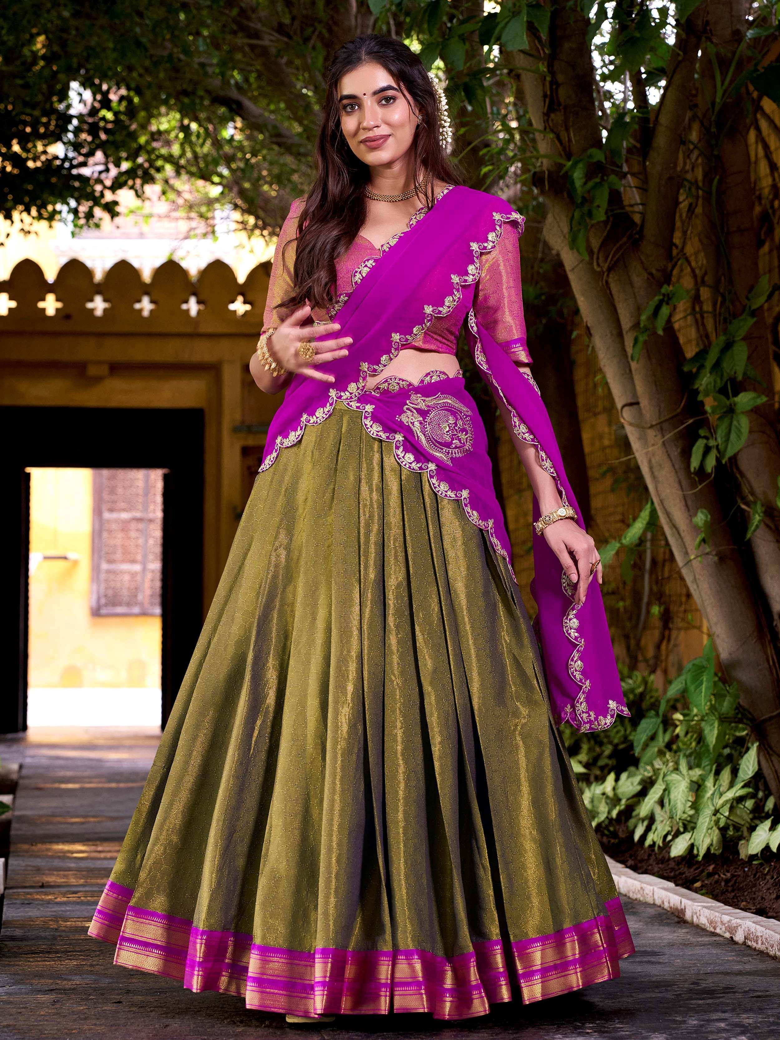 Vibrant purple and olive green lehenga choli with gold embroidery, perfect for Indian ethnic wear occasions.