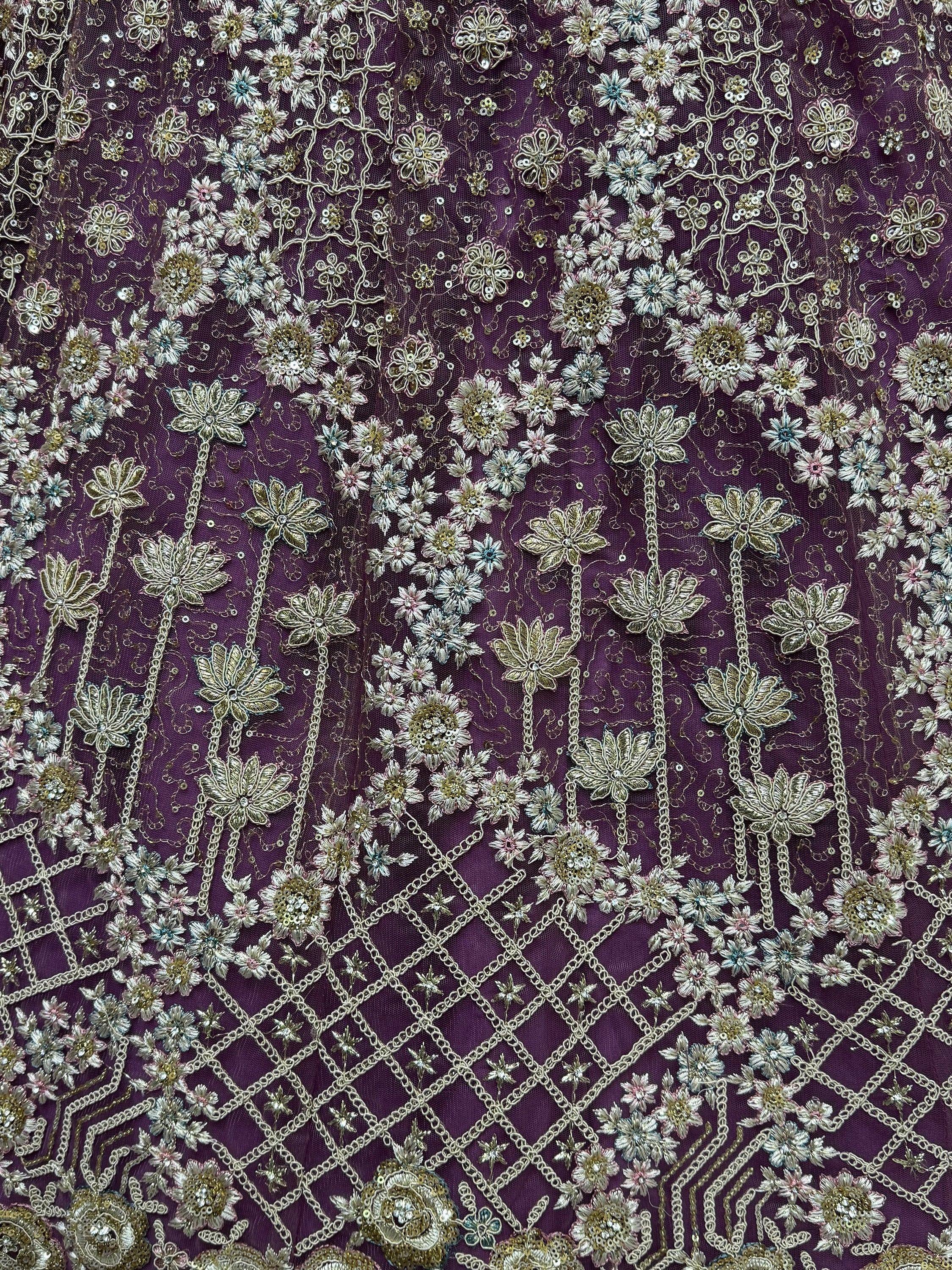 Purple ethnic fabric with floral embroidery, sequins, and chain detailing for designer lehenga or saree