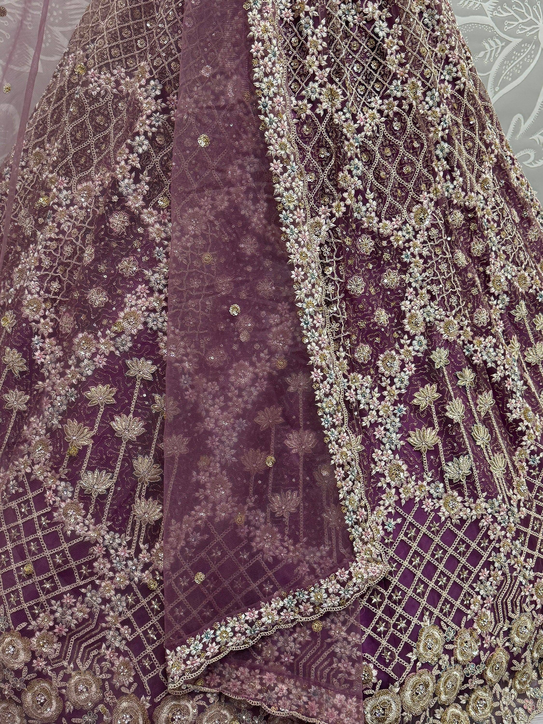 Purple embroidered lehenga with floral zari work and sequin detailing, ideal for Indian ethnic wear