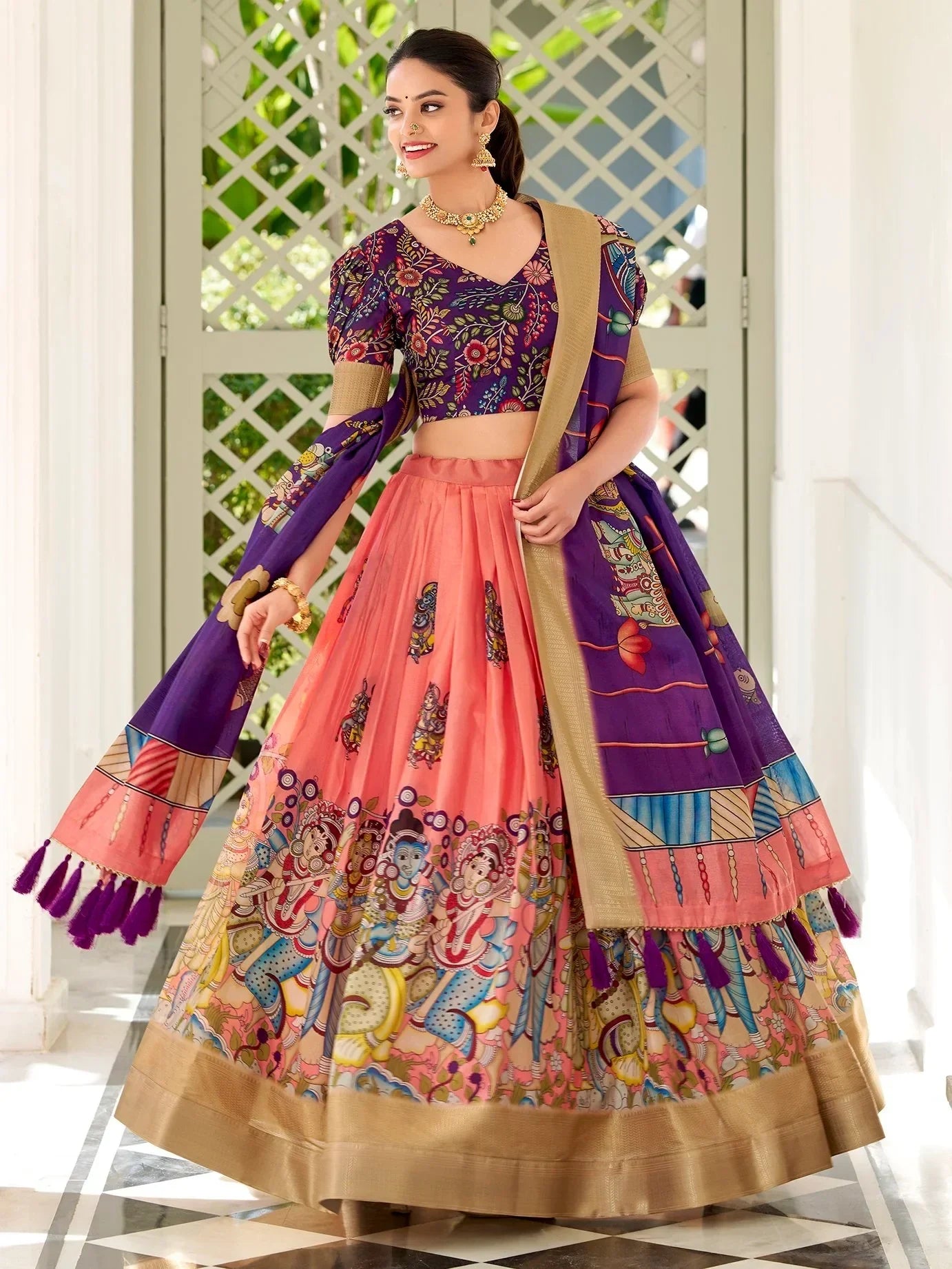 Purple and peach printed lehenga choli with temple art design, perfect for Indian ethnic occasions