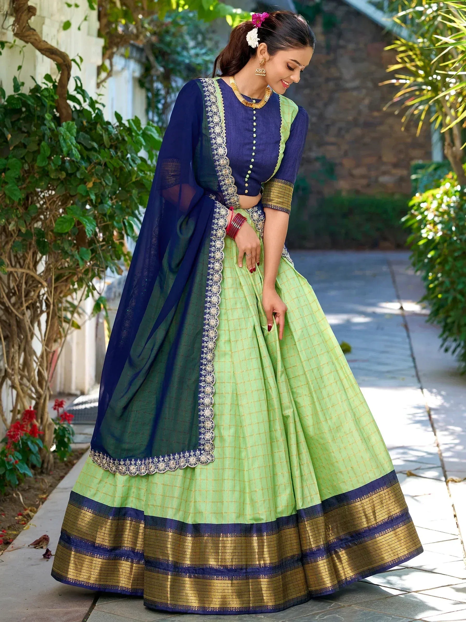 Green and blue designer lehenga choli with gold embroidery and dupatta