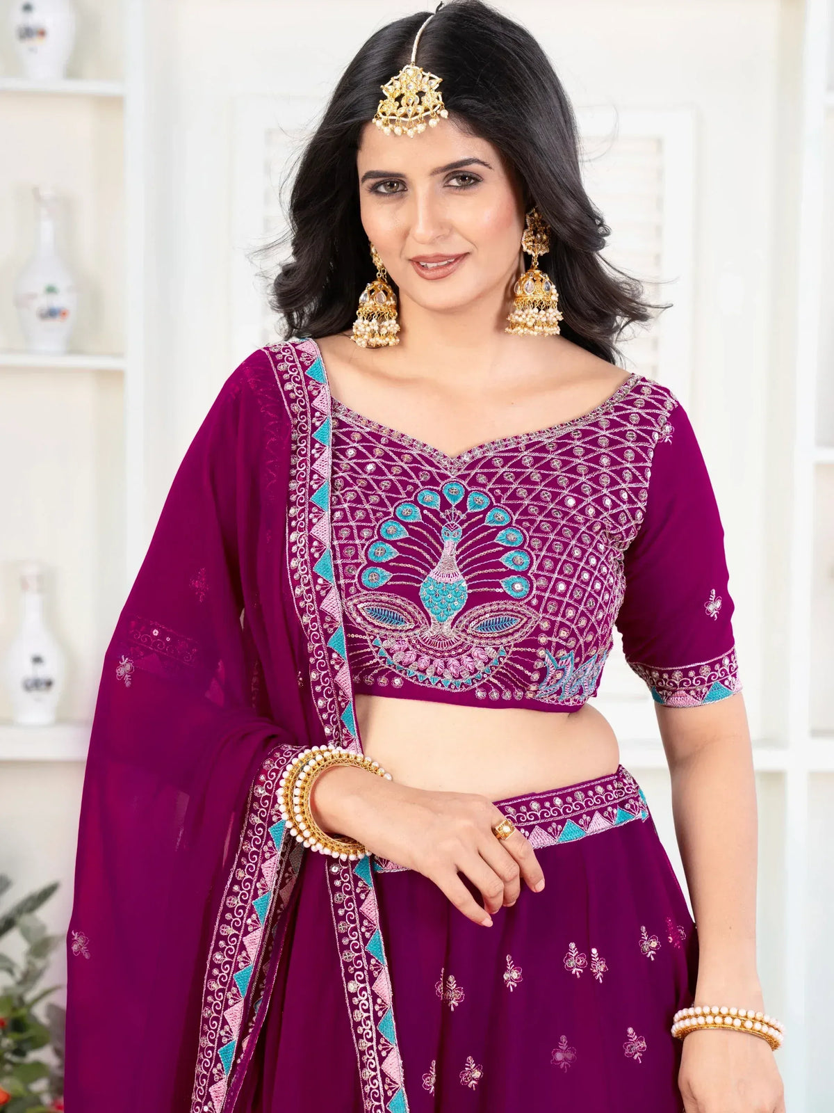 Purple lehenga choli with peacock embroidery, perfect for Indian ethnic wear and festive occasions.