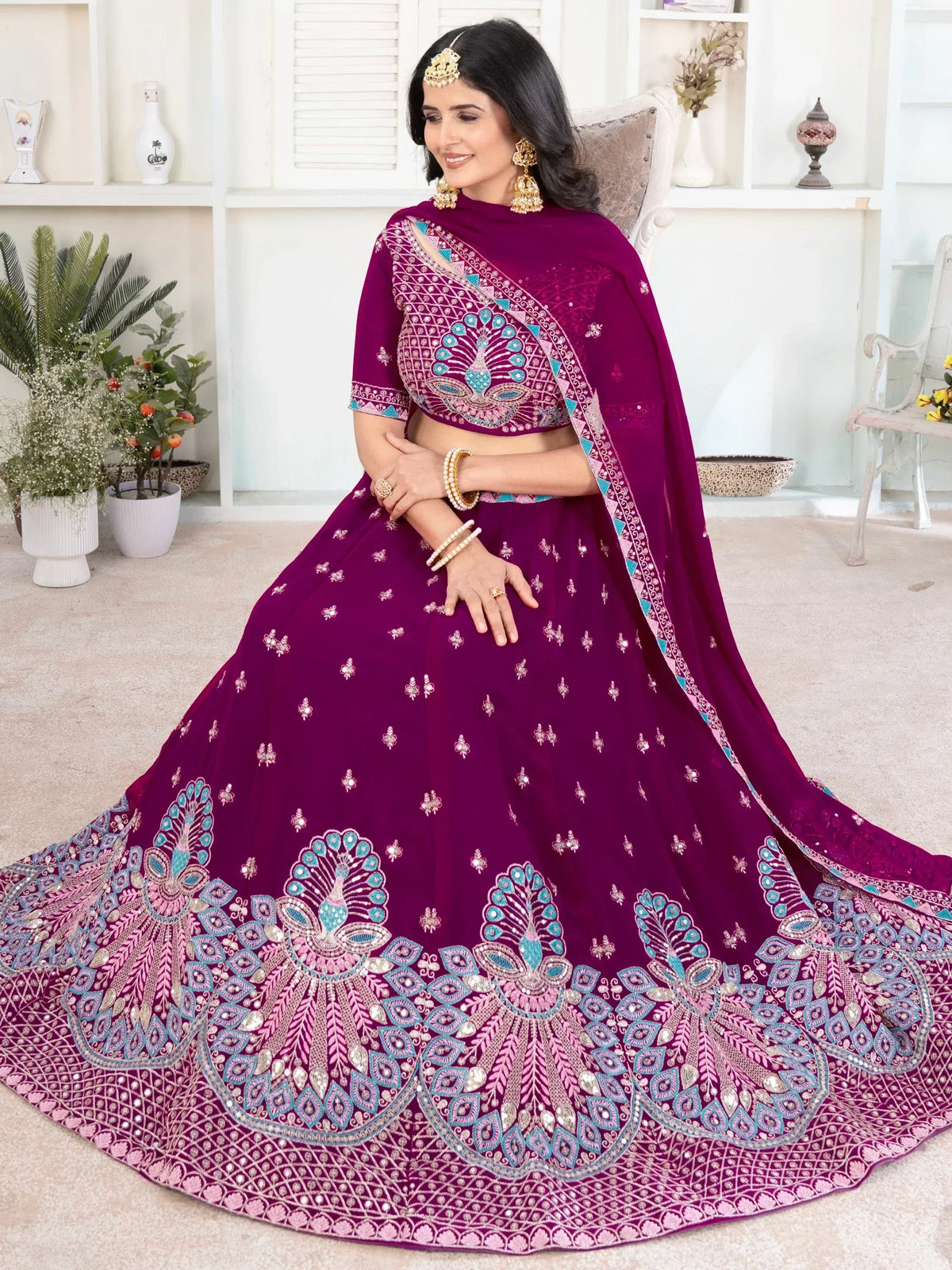 Elegant purple lehenga choli with peacock embroidery and turquoise accents for Indian ethnic wear