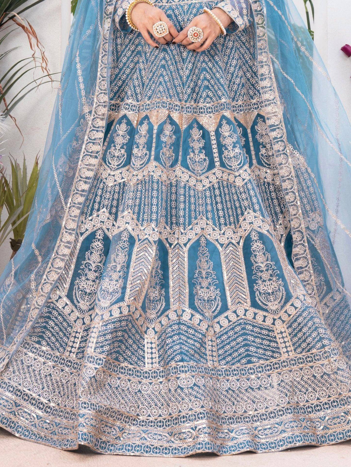 Blue embroidered lehenga with gold detailing, perfect for Indian ethnic wear and festive occasions.