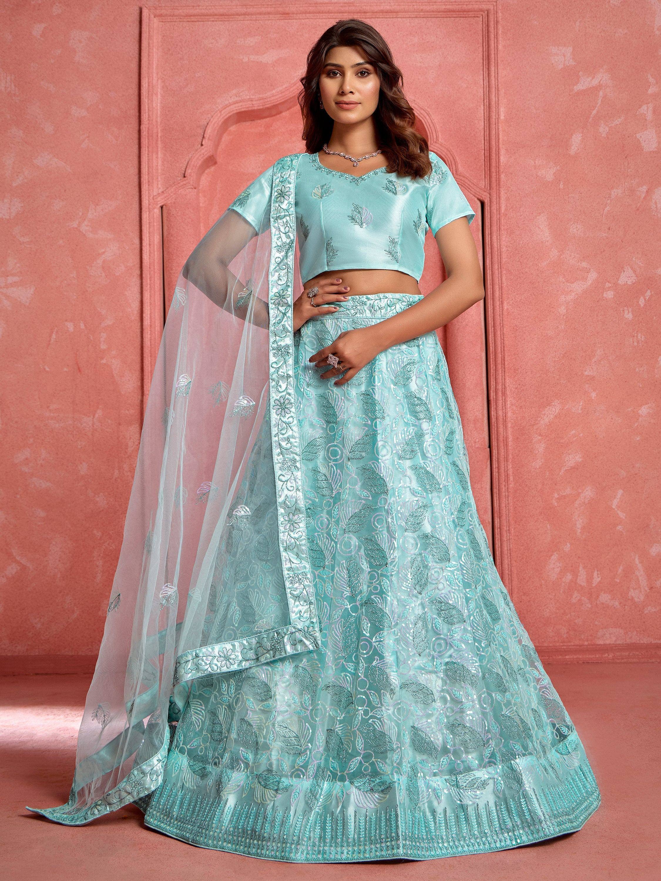 Mint green embroidered lehenga choli with sheer dupatta, perfect for Indian ethnic wear occasions