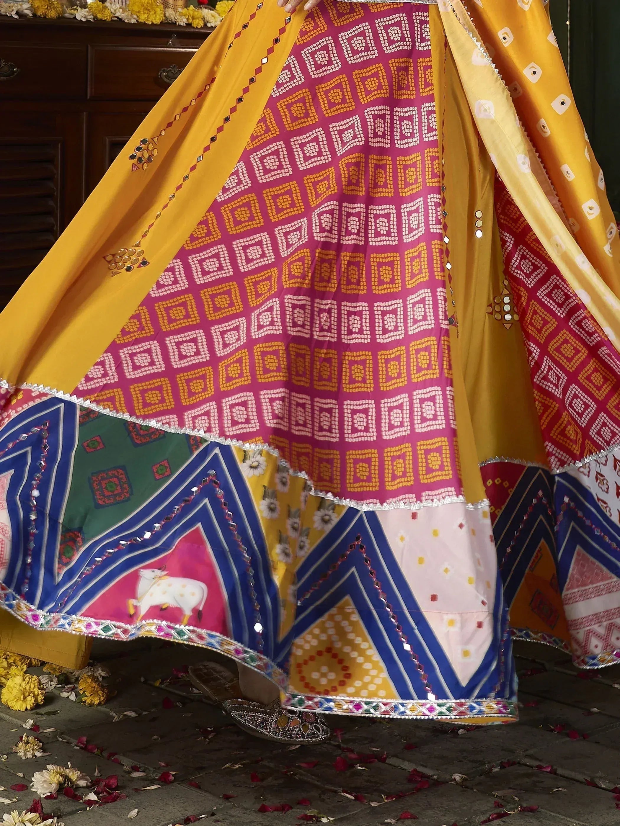 Vibrant Indian ethnic lehenga with mirror work, geometric prints, and colorful patchwork design