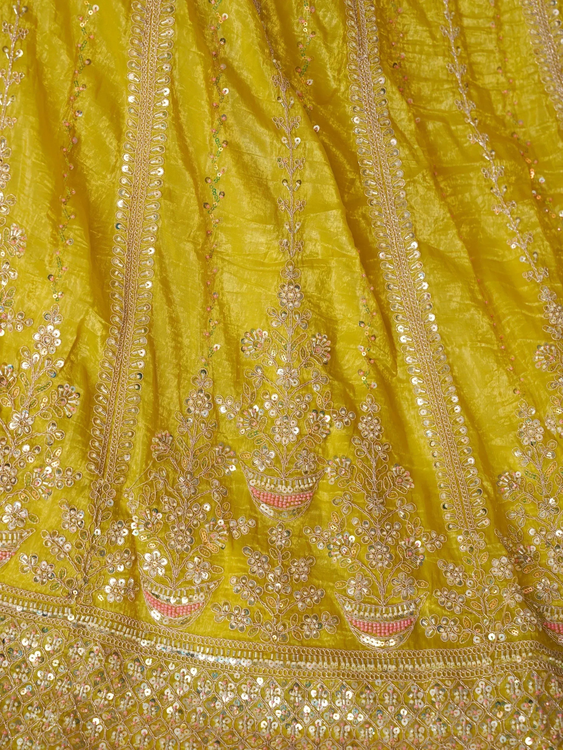 Yellow ethnic gown with floral mirror and sequin embroidery, perfect for Indian festive wear.
