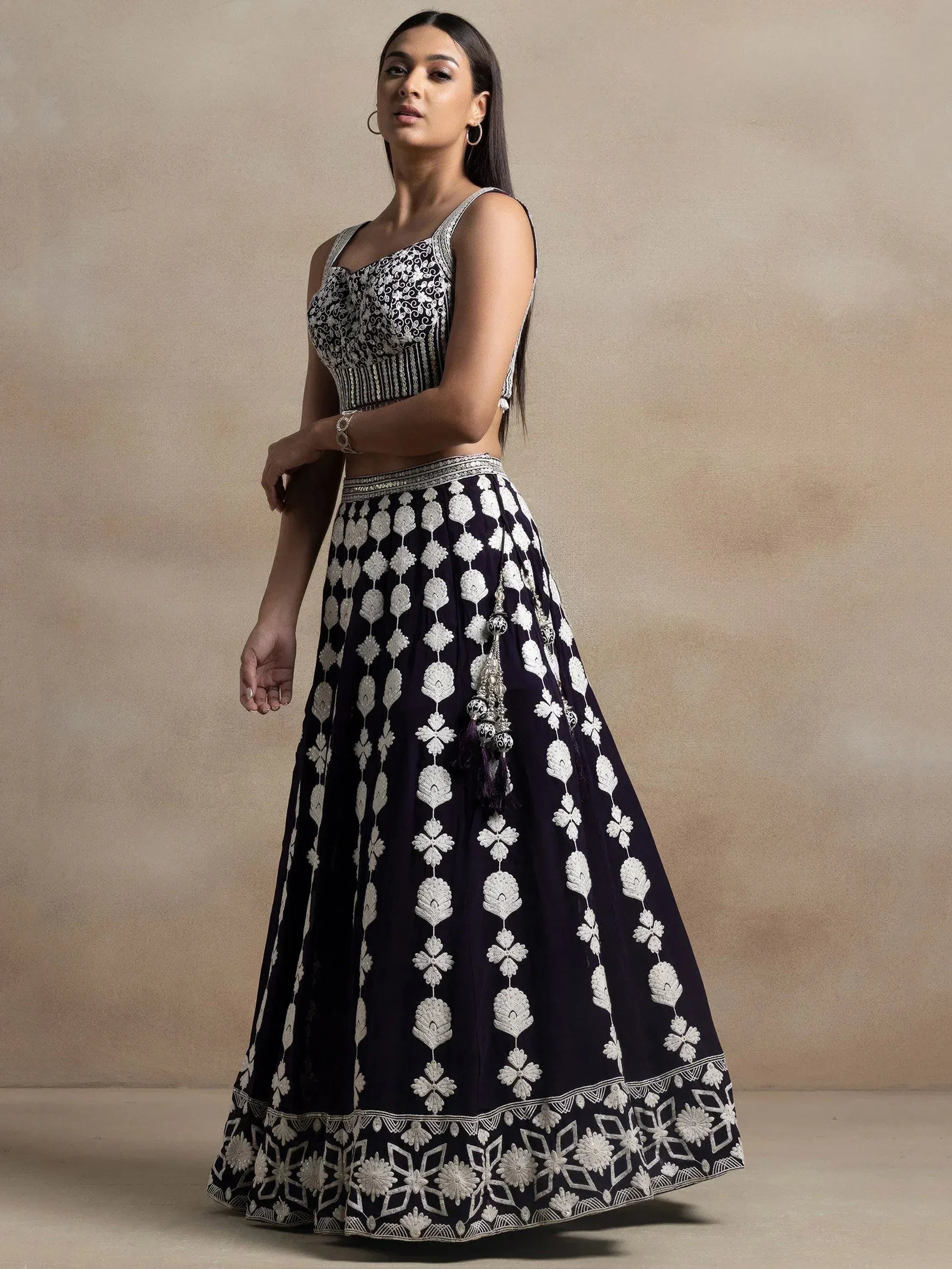 Navy blue lehenga choli with white floral embroidery and tassels, Indian ethnic wear