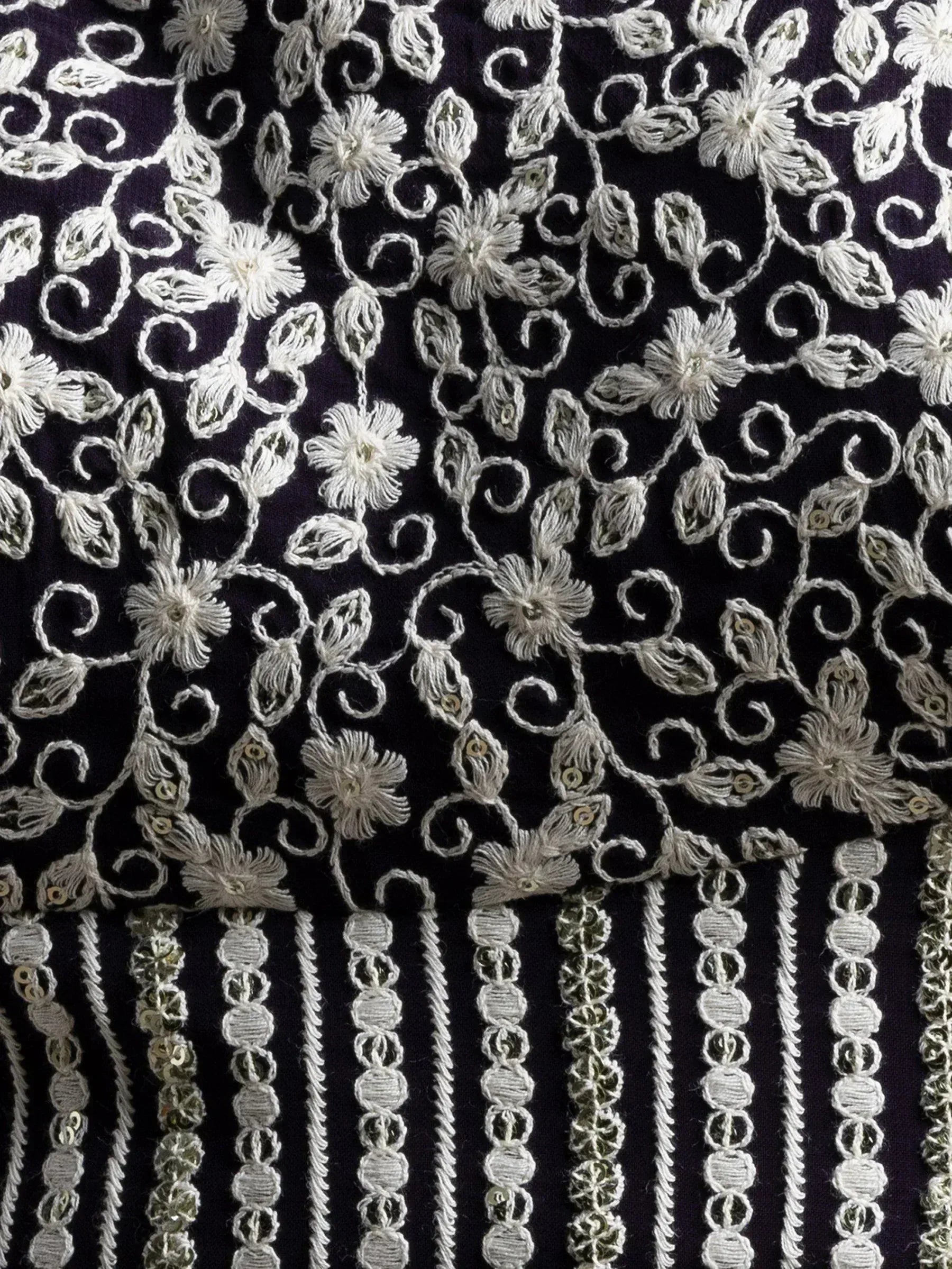 Black ethnic wear with white floral embroidery and sequin detailing for designer lehenga or saree