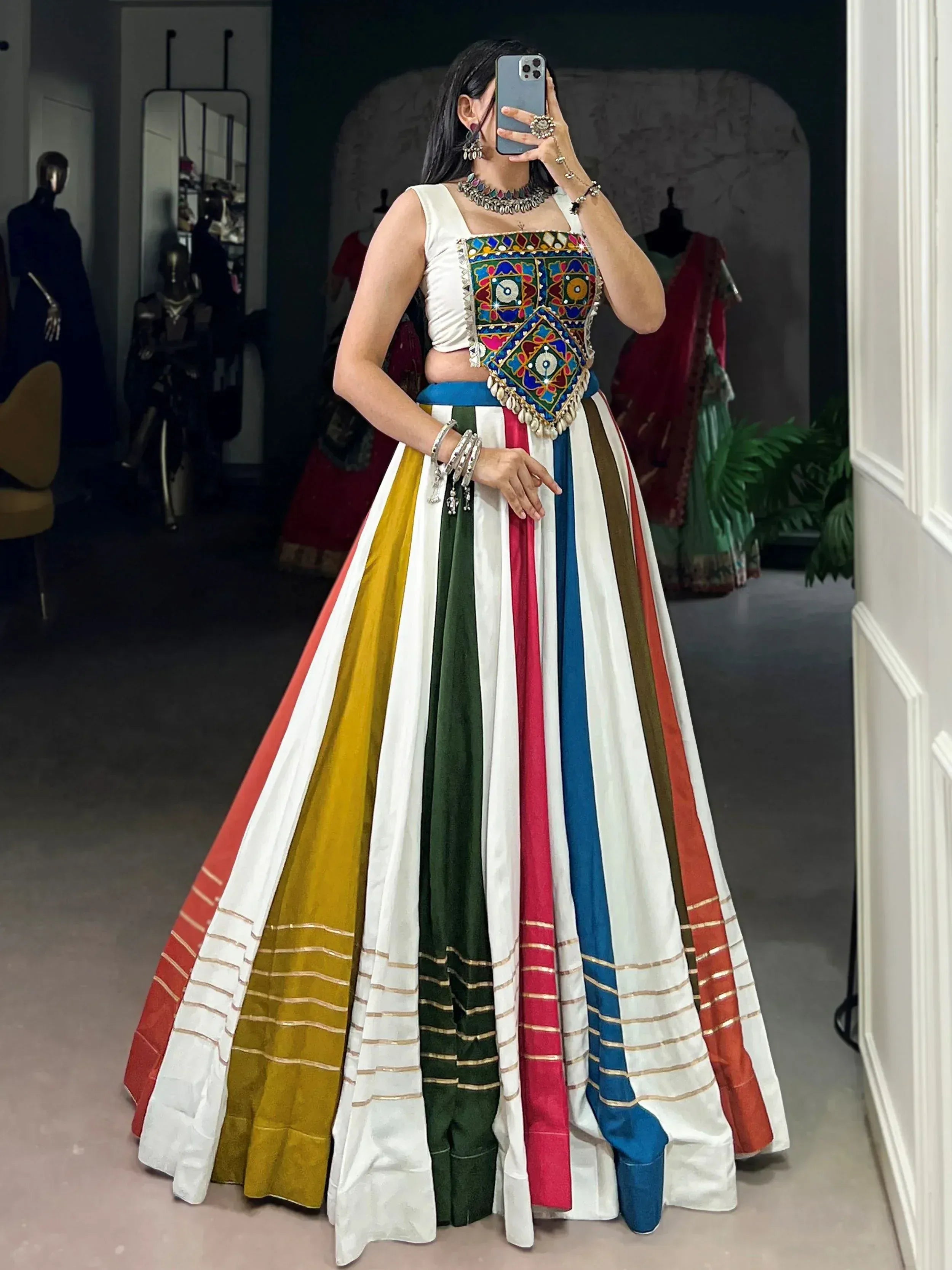 Colorful striped lehenga with embroidered blouse, perfect for Indian ethnic wear