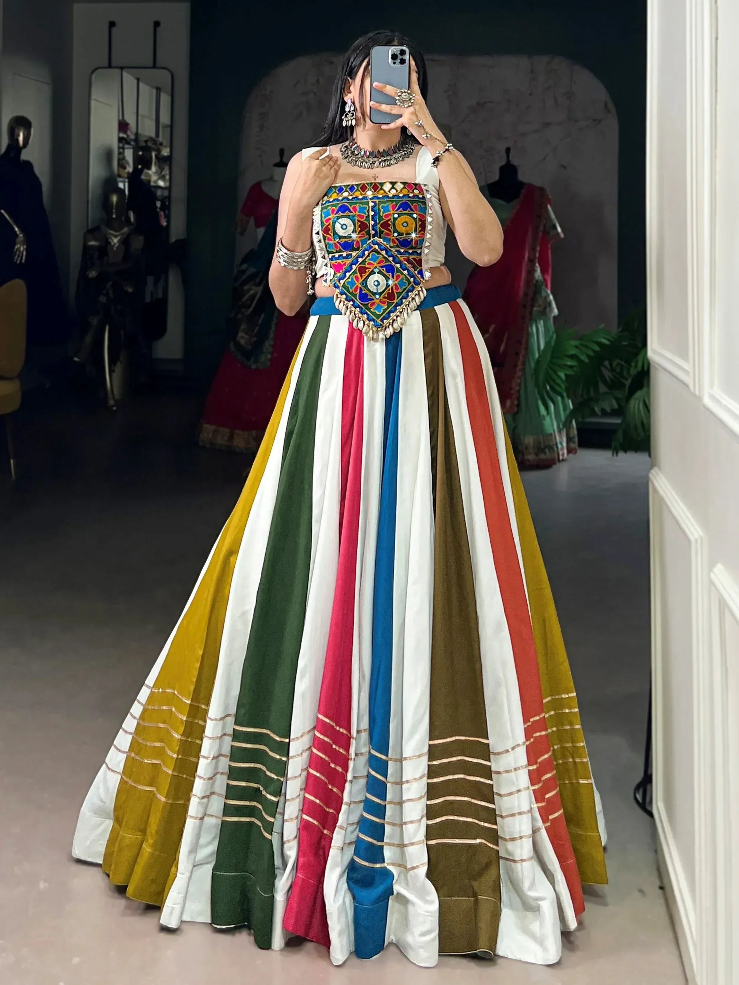Colorful striped lehenga with embroidered blouse, perfect for Indian ethnic wear