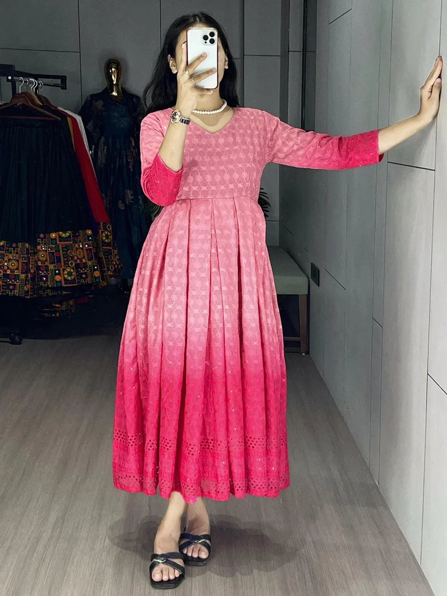 Pink ethnic gown with floral print and pleated skirt, perfect for Indian occasions