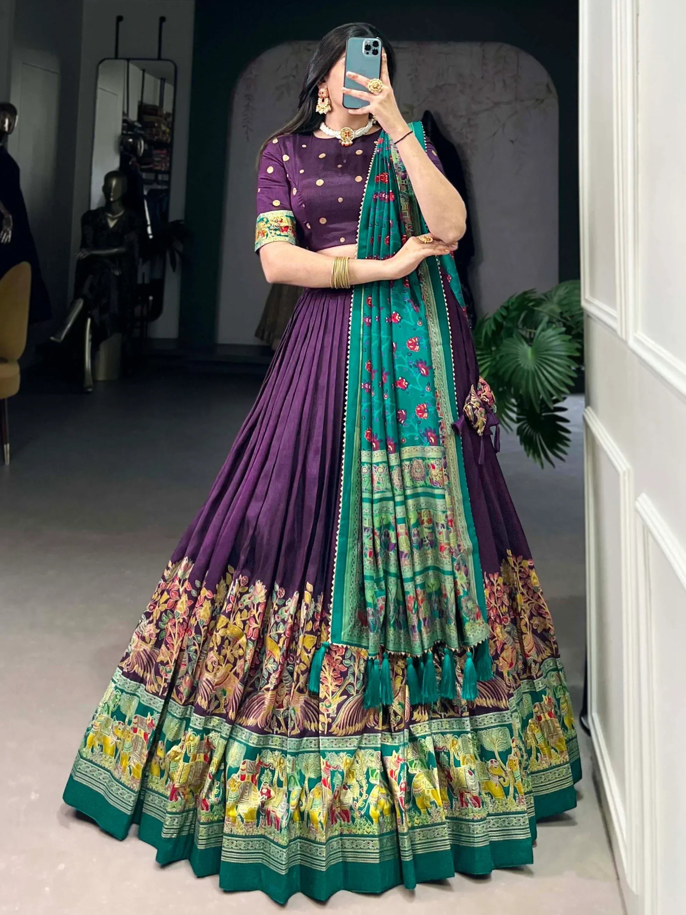 Purple and green designer lehenga choli with floral and elephant print, perfect for Indian ethnic wear occasions