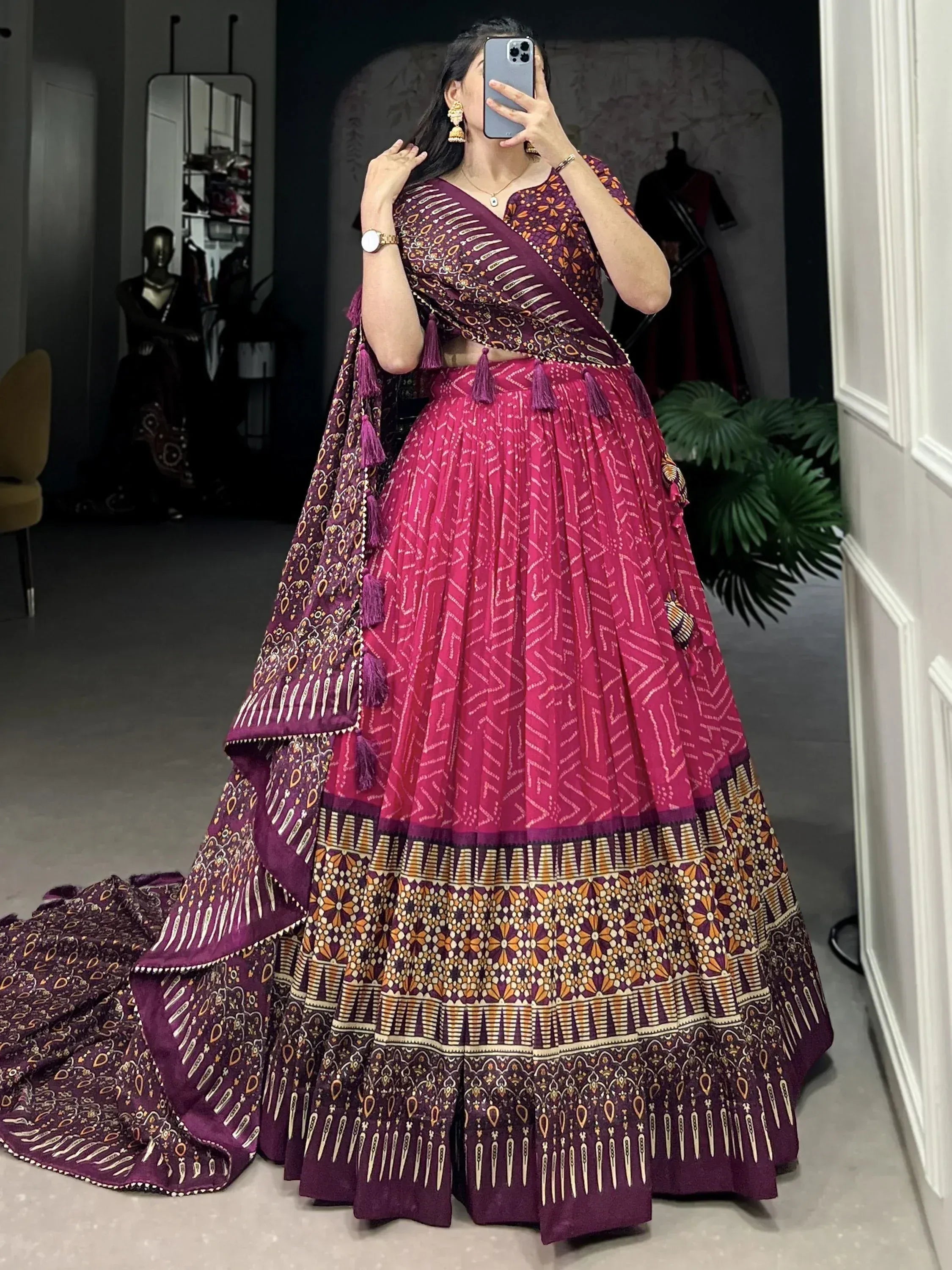 Purple and pink printed lehenga choli with tassels, ethnic Indian wear for women