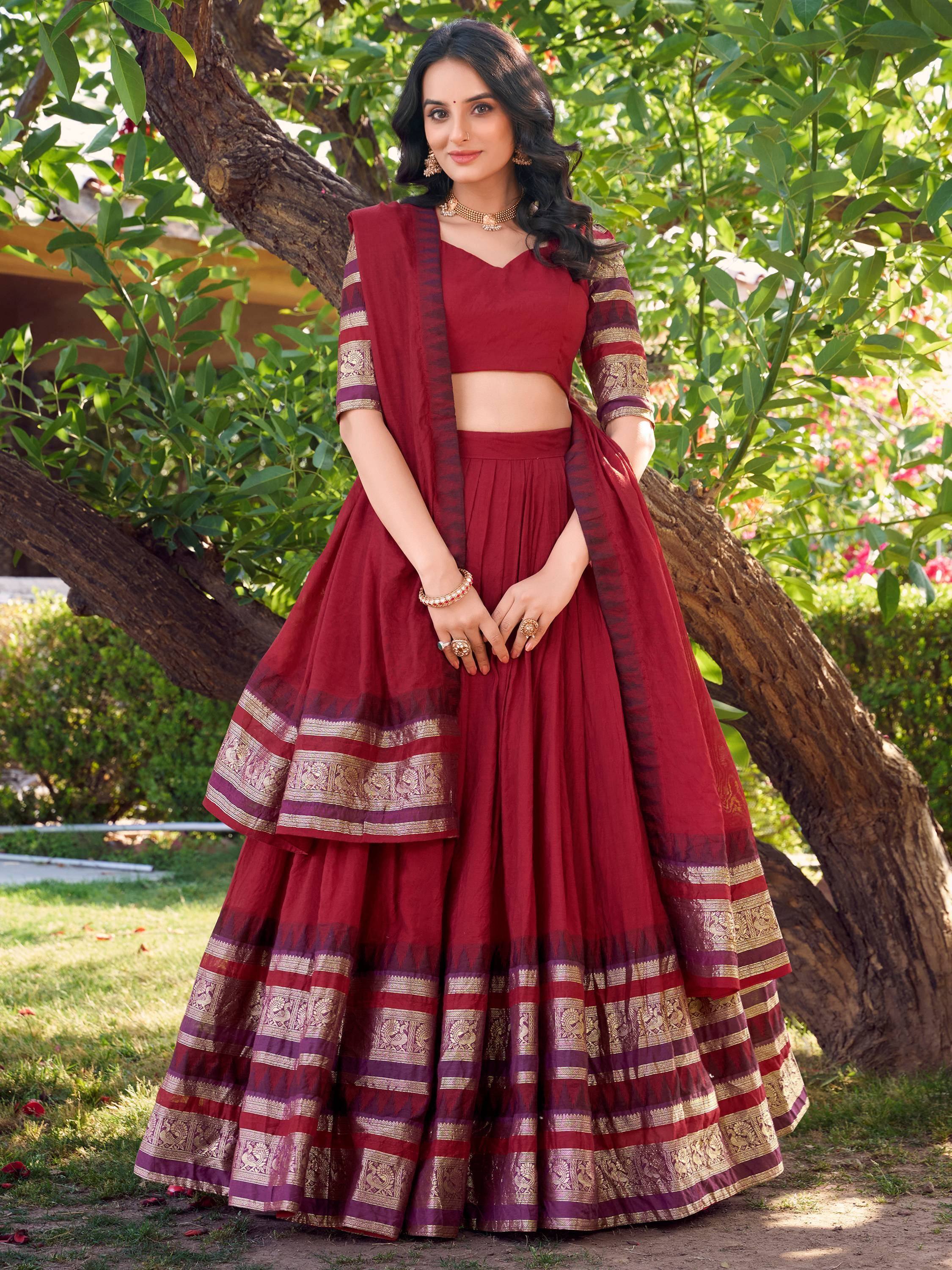 Maroon designer lehenga choli with gold border, perfect for Indian ethnic wear and festive occasions