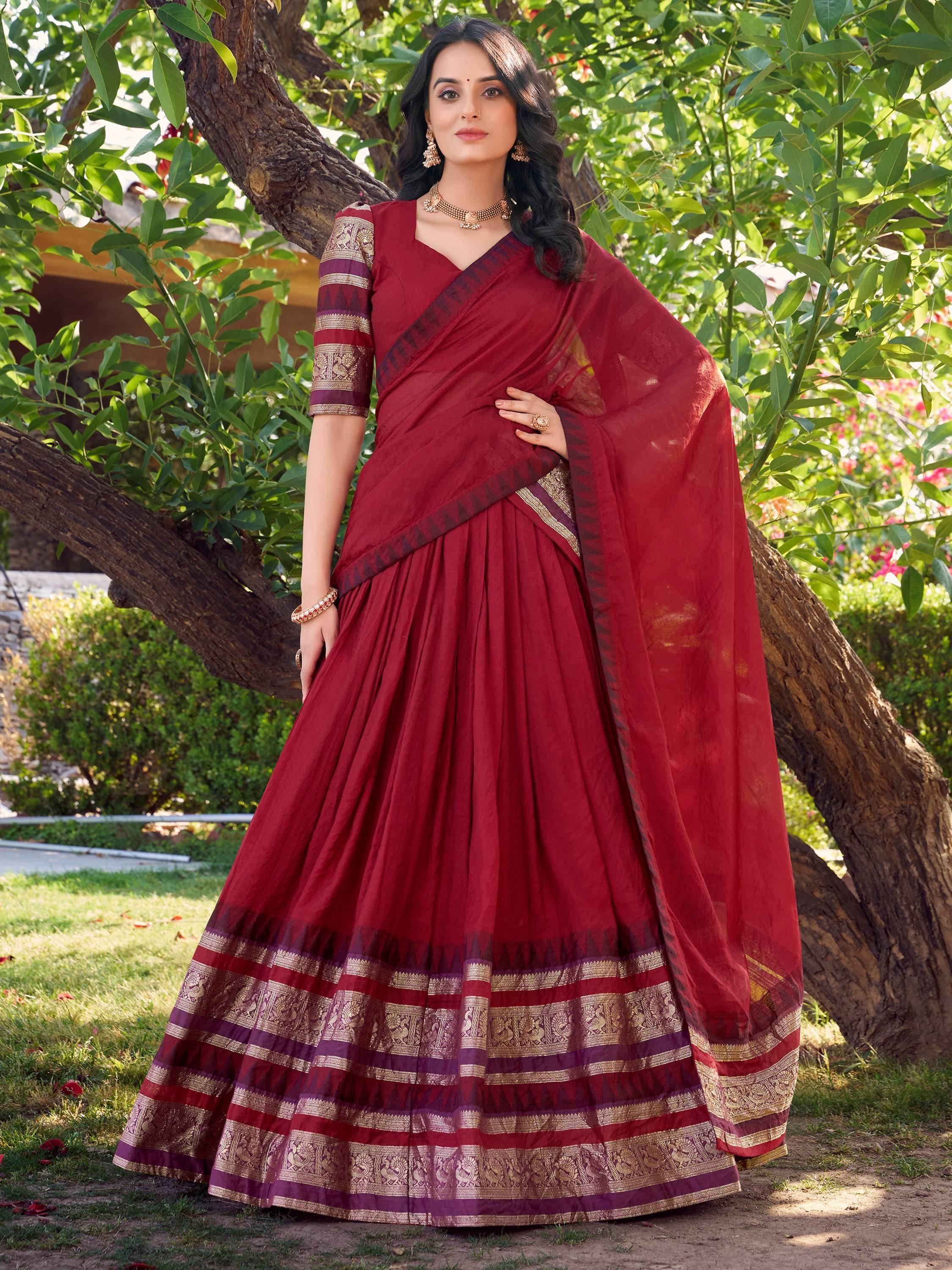 Maroon designer lehenga choli with gold border, perfect for Indian ethnic wear occasions