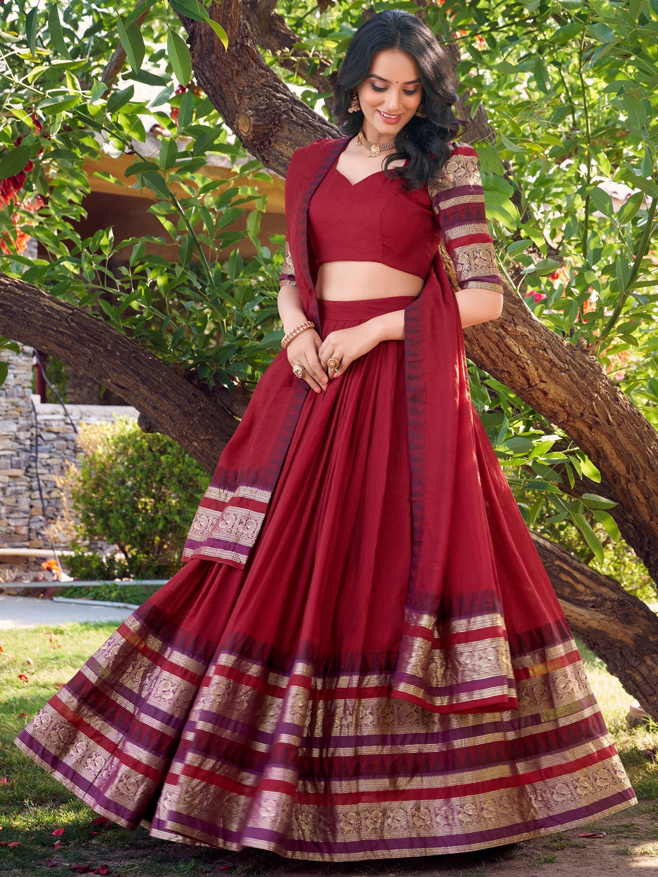 Maroon designer lehenga choli with gold border, perfect for Indian ethnic wear occasions