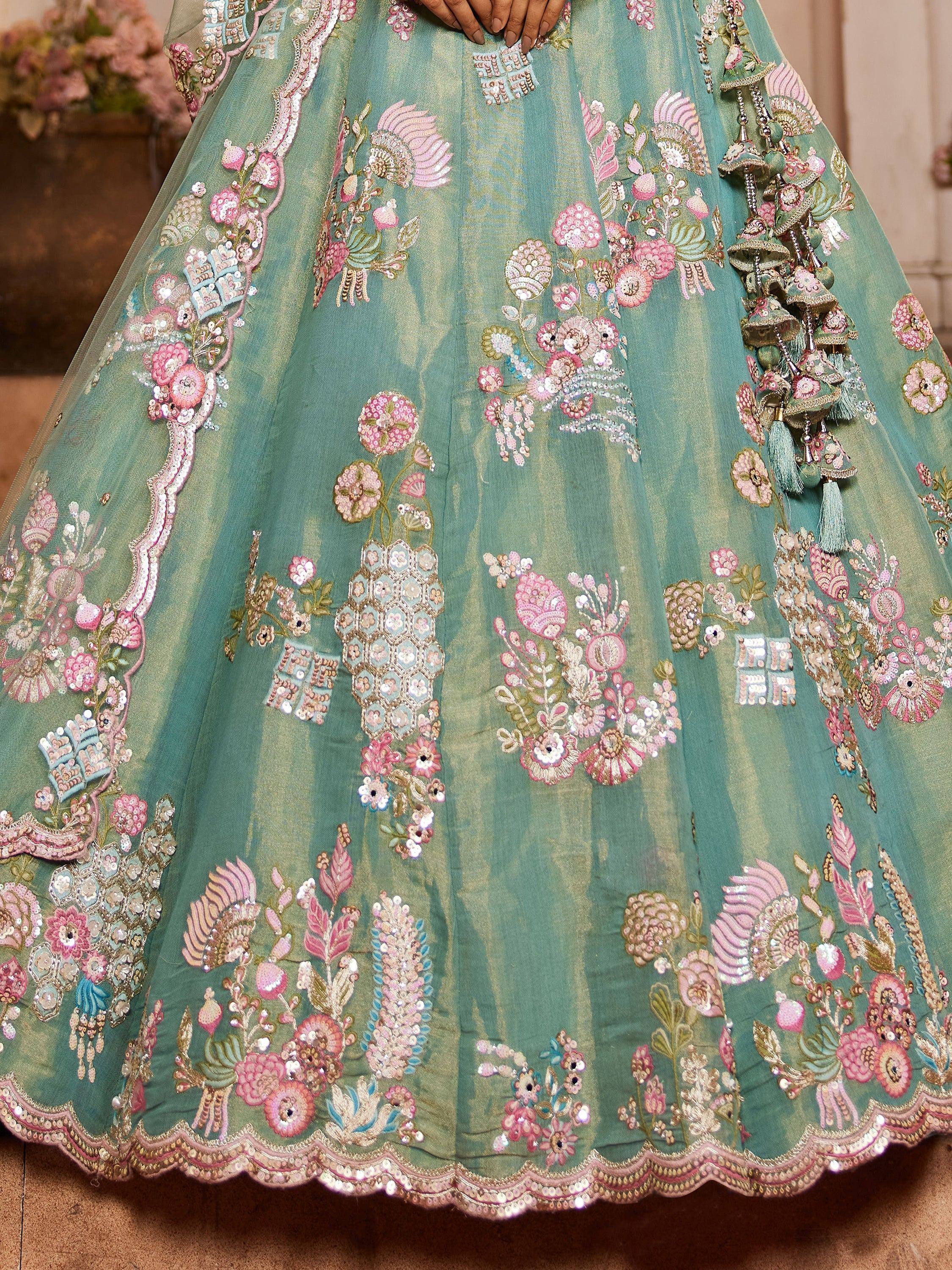 Teal lehenga with pink floral embroidery and tassels, Indian ethnic wear