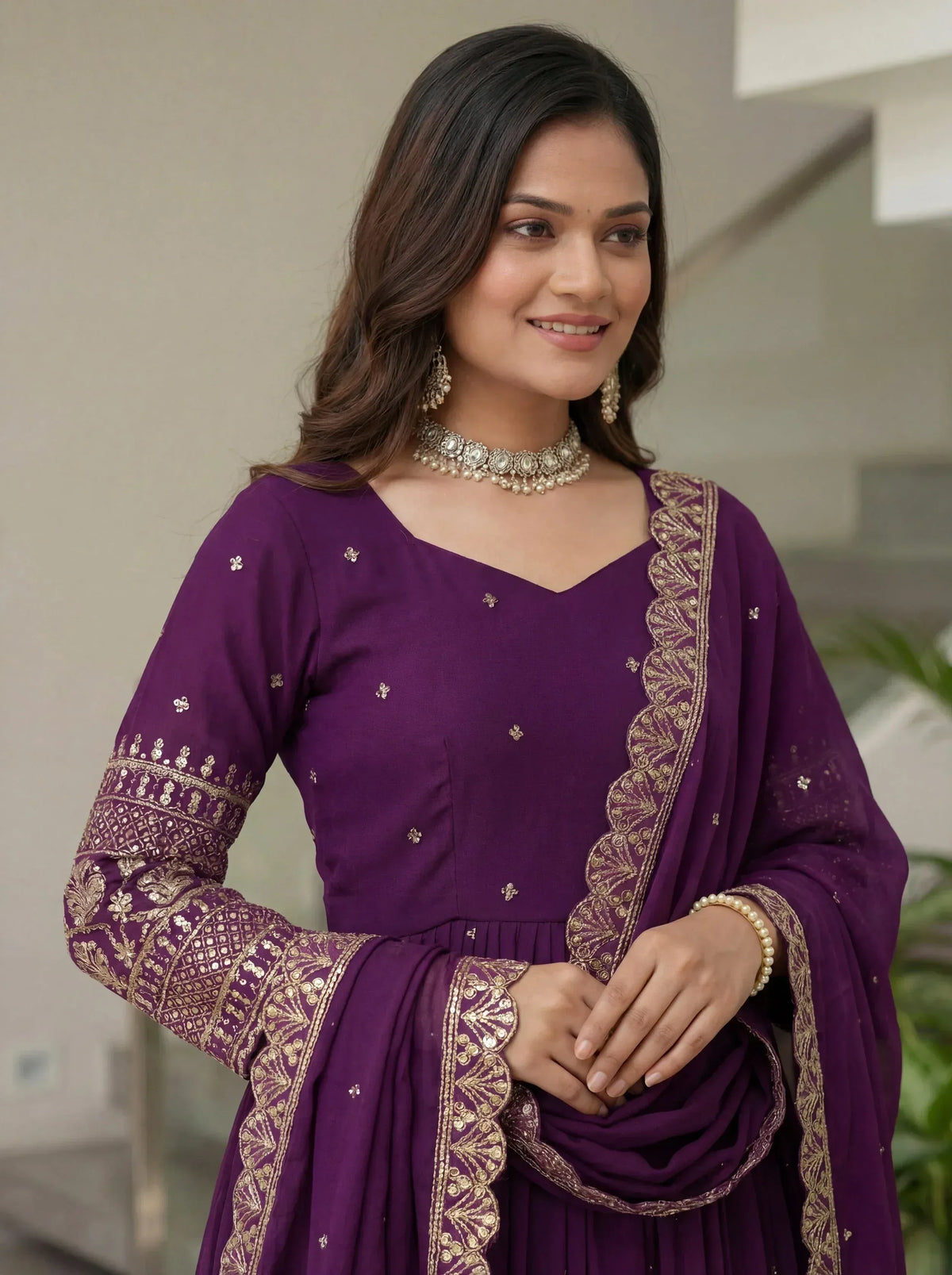Purple ethnic wear with gold embroidery, perfect for Indian occasions and festive events.