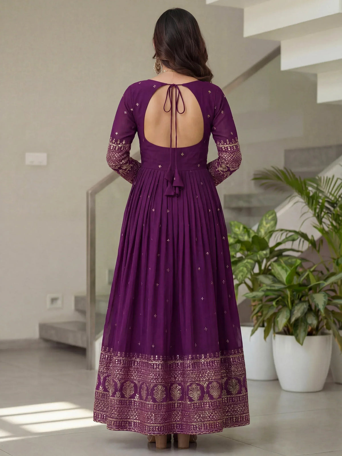Purple ethnic gown with gold embroidery, open back tie, and pleated skirt for women