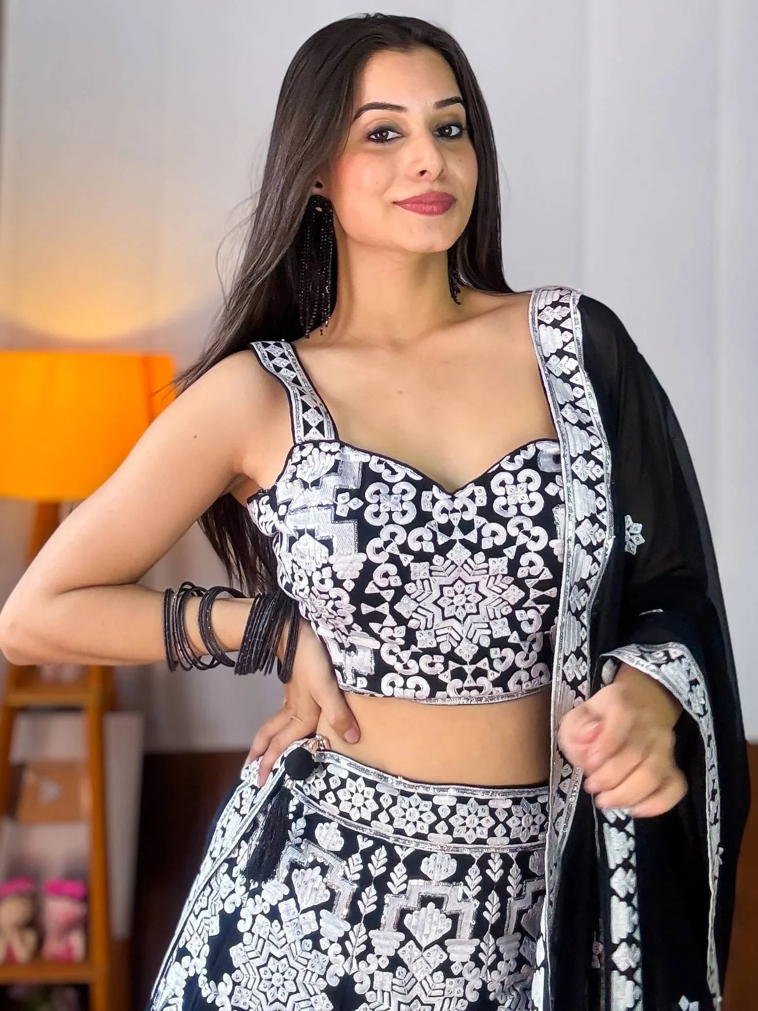 Black and white embroidered lehenga choli with matching dupatta, stylish ethnic wear for women