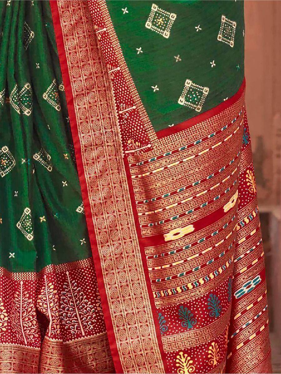 Green and red ethnic saree with intricate block print and woven border details