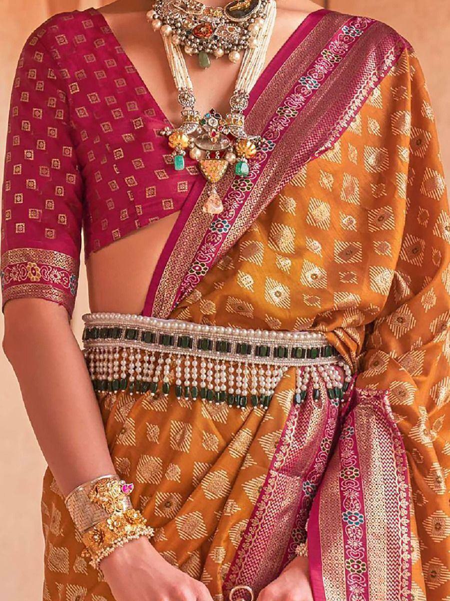 Enthralling Mustard Yellow Patola Printed Silk Traditional Saree