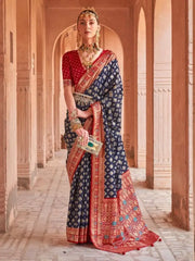 Capricious Navy Blue Patola Printed Silk Festive Wear Saree