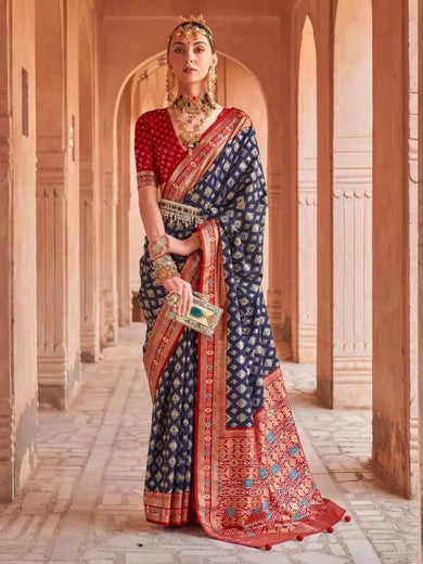Capricious Navy Blue Patola Printed Silk Festive Wear Saree