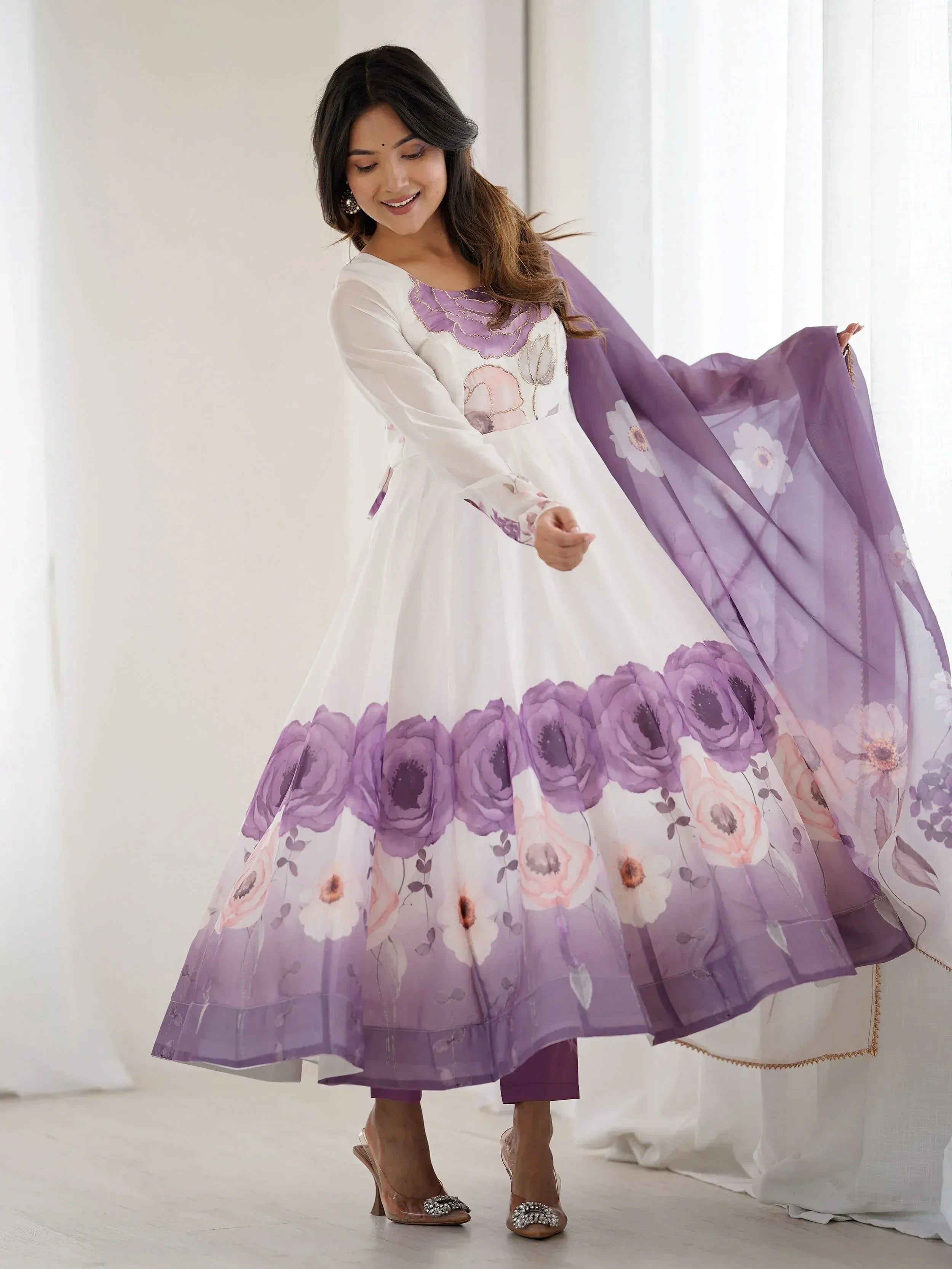 White and purple floral ethnic gown with matching dupatta, perfect for Indian occasions