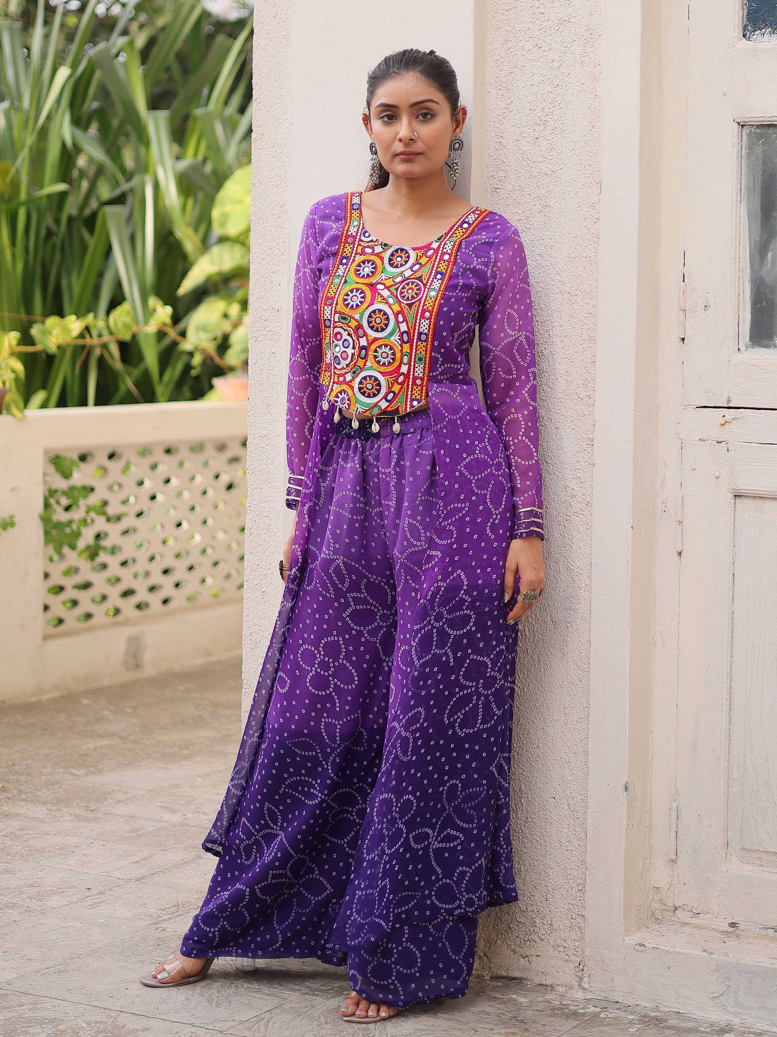 Purple ethnic palazzo set with colorful mirror work top, perfect for Indian wear occasions