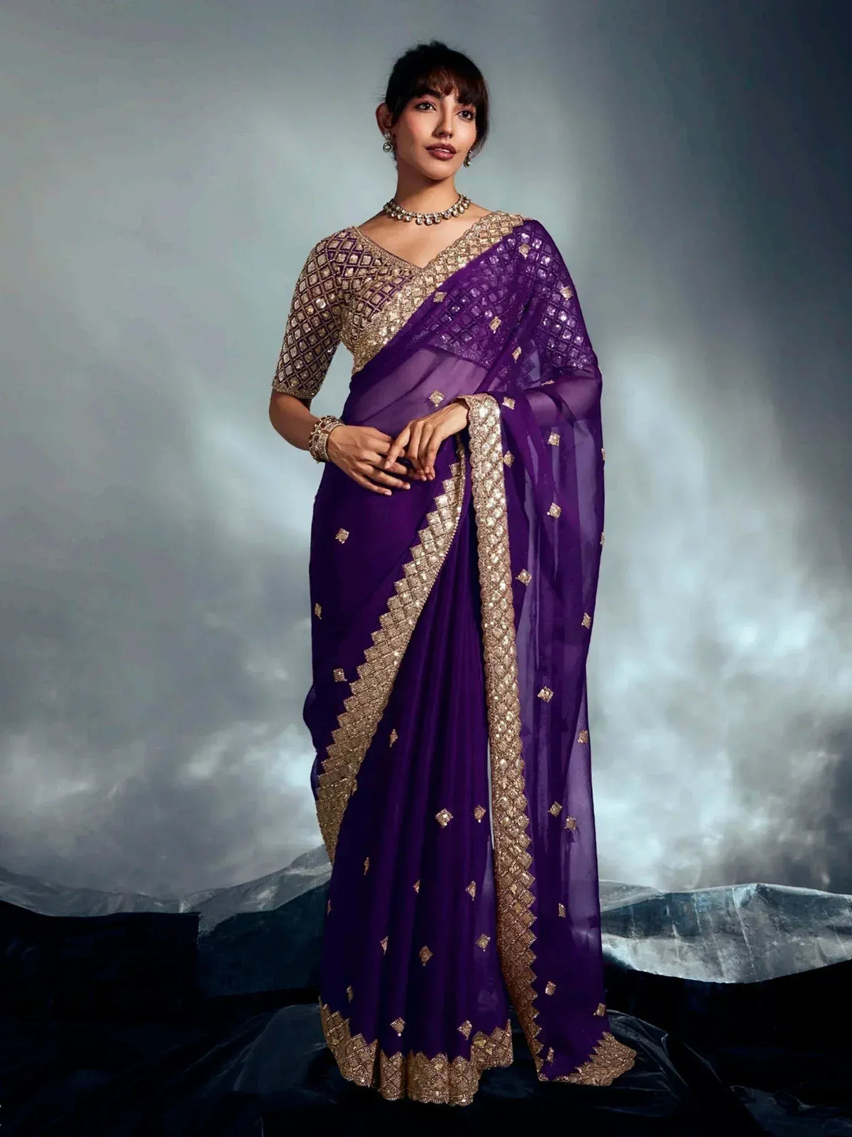 Purple designer saree with gold embroidery, perfect for Indian ethnic wear and festive occasions