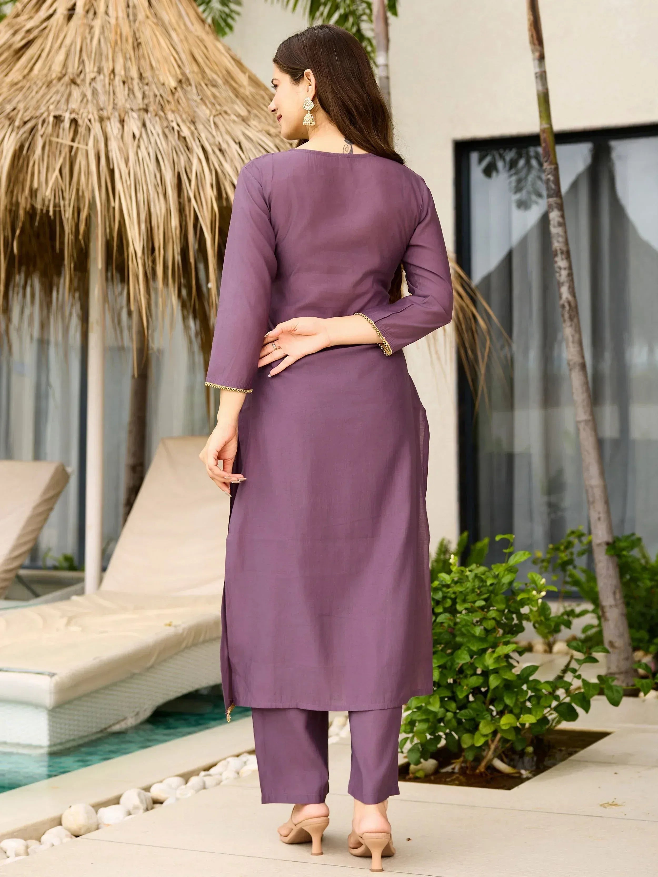 Purple ethnic kurta set with gold trim, perfect for casual or semi-formal occasions