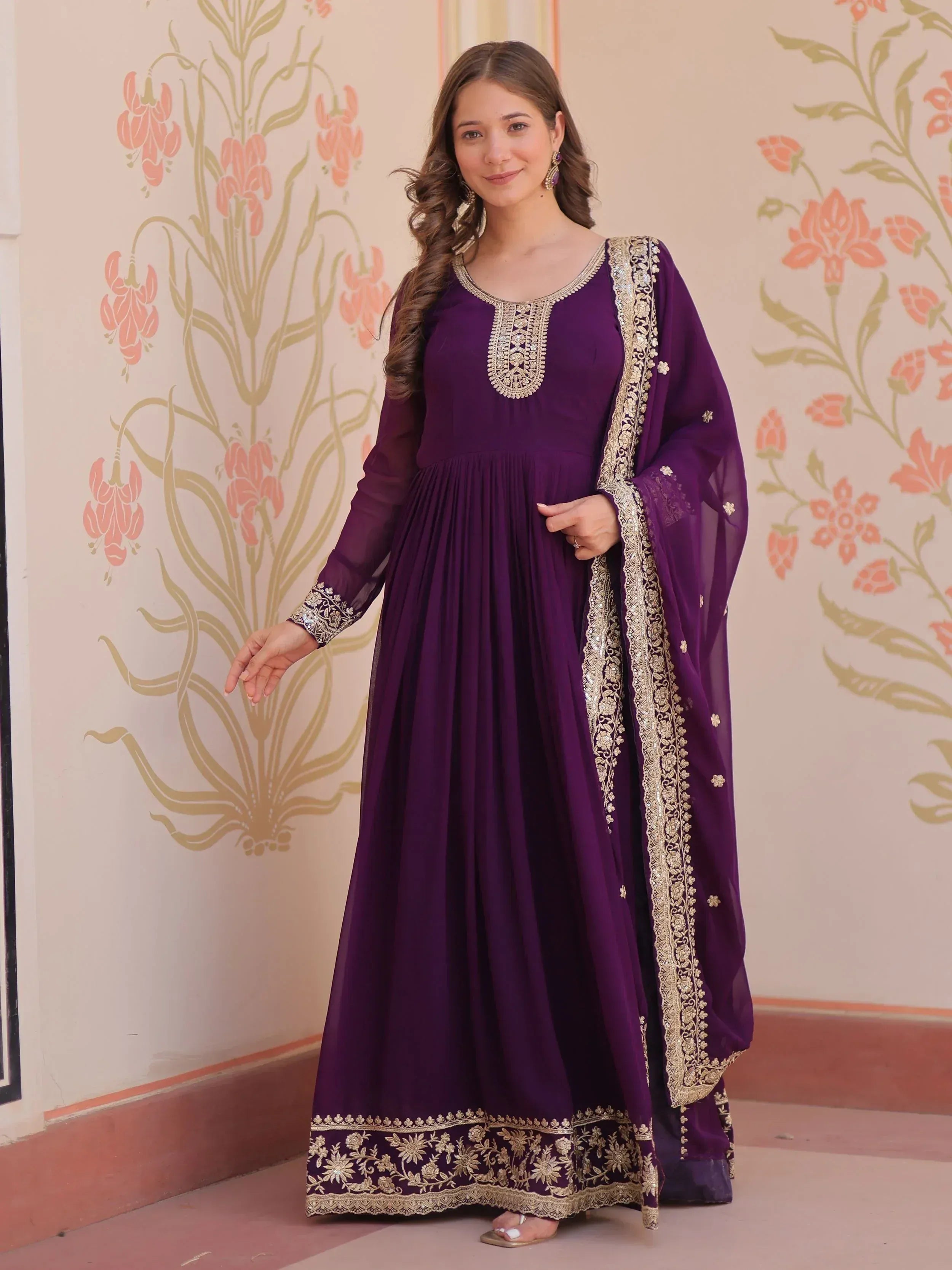 Purple ethnic anarkali gown with gold embroidery, perfect for Indian occasions and festive wear