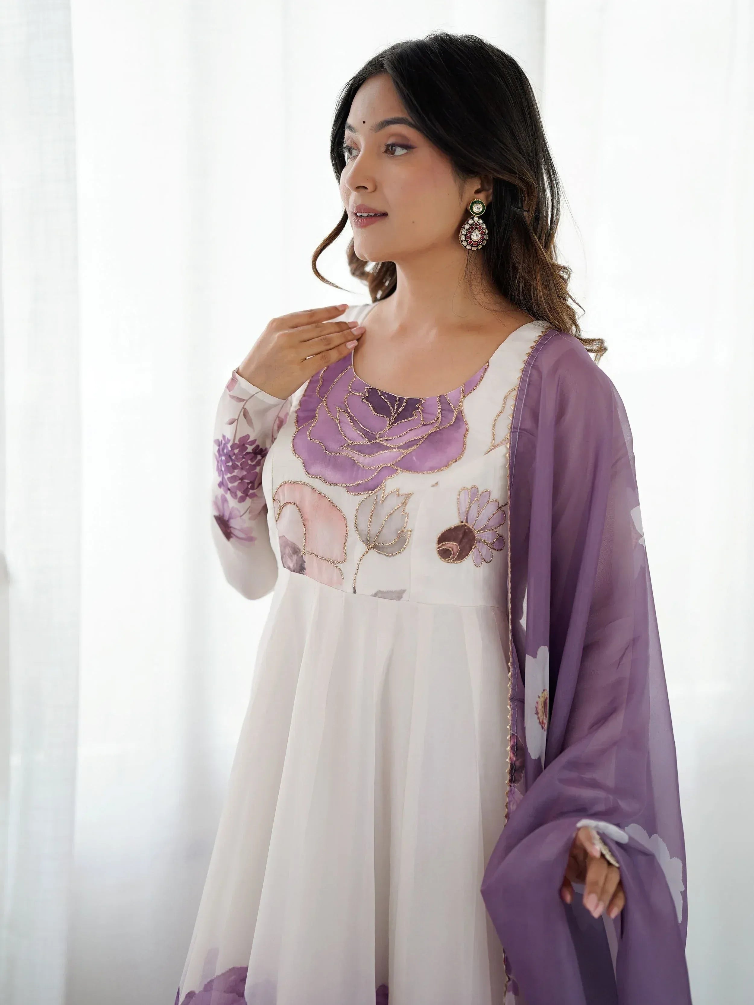 White and purple floral embroidered ethnic gown with matching dupatta, perfect for Indian occasions