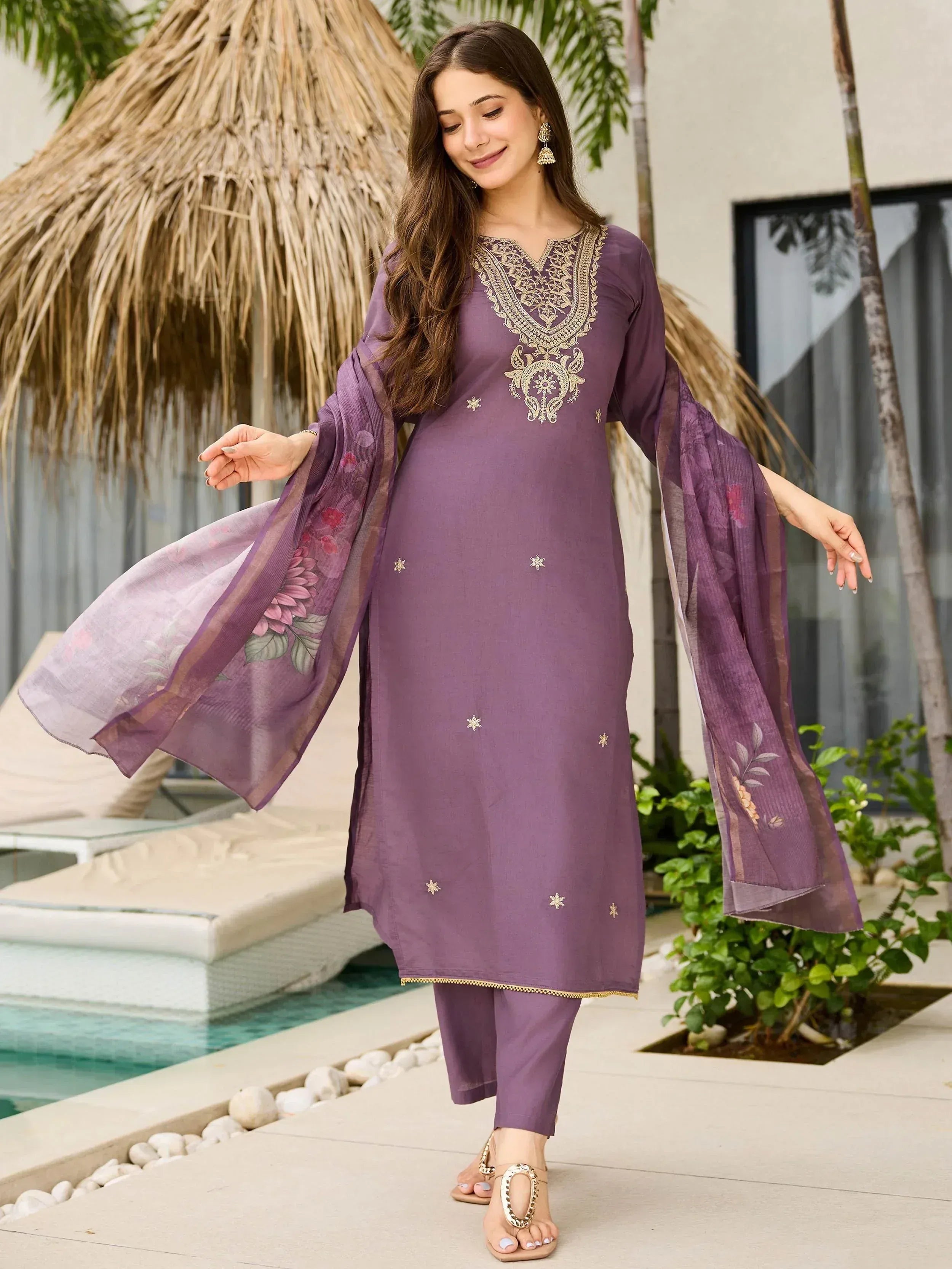Purple embroidered salwar kameez with floral dupatta, perfect for ethnic wear occasions