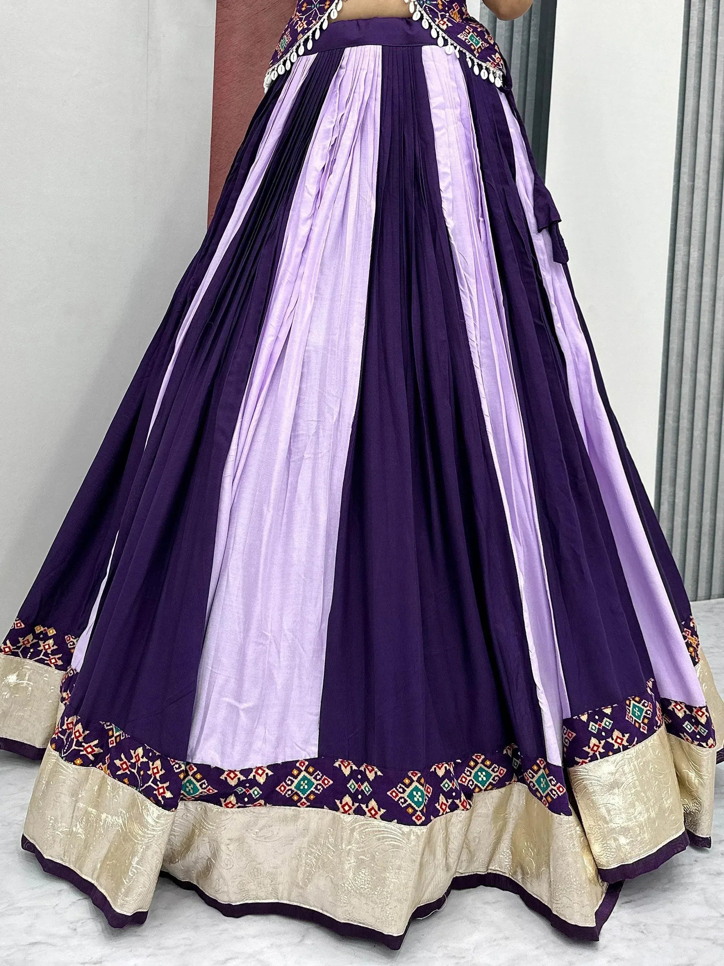Purple and lavender striped lehenga choli with embroidered border and gold trim, Indian ethnic wear