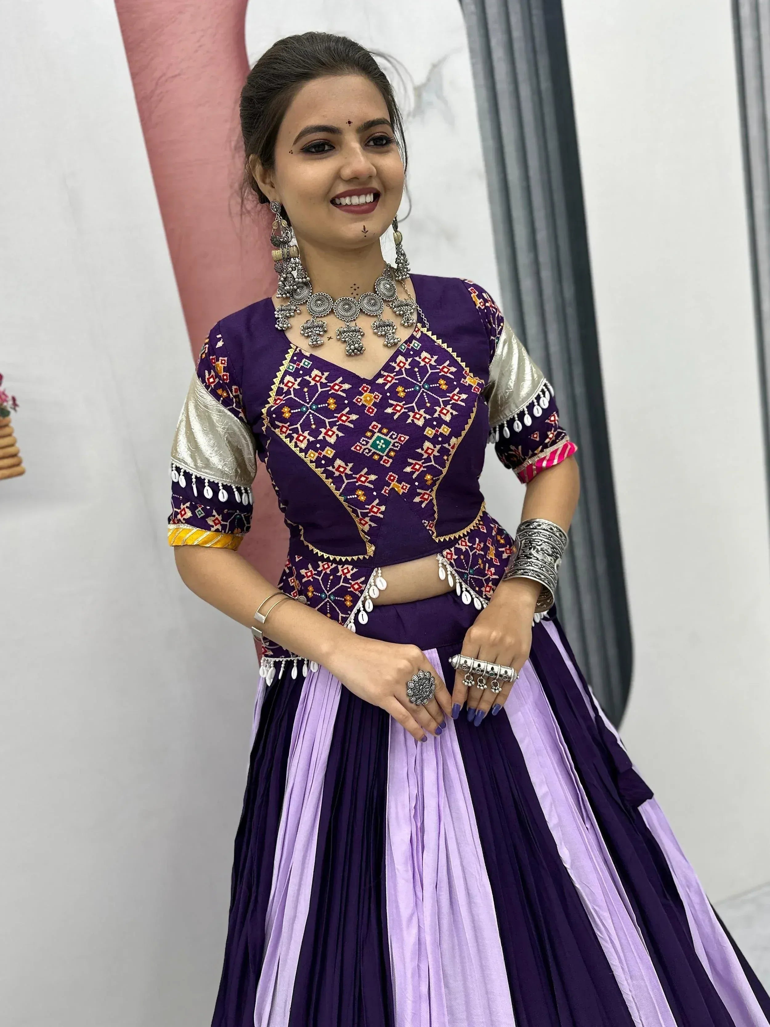 Purple embroidered lehenga choli with silver jewelry, Indian ethnic wear for women