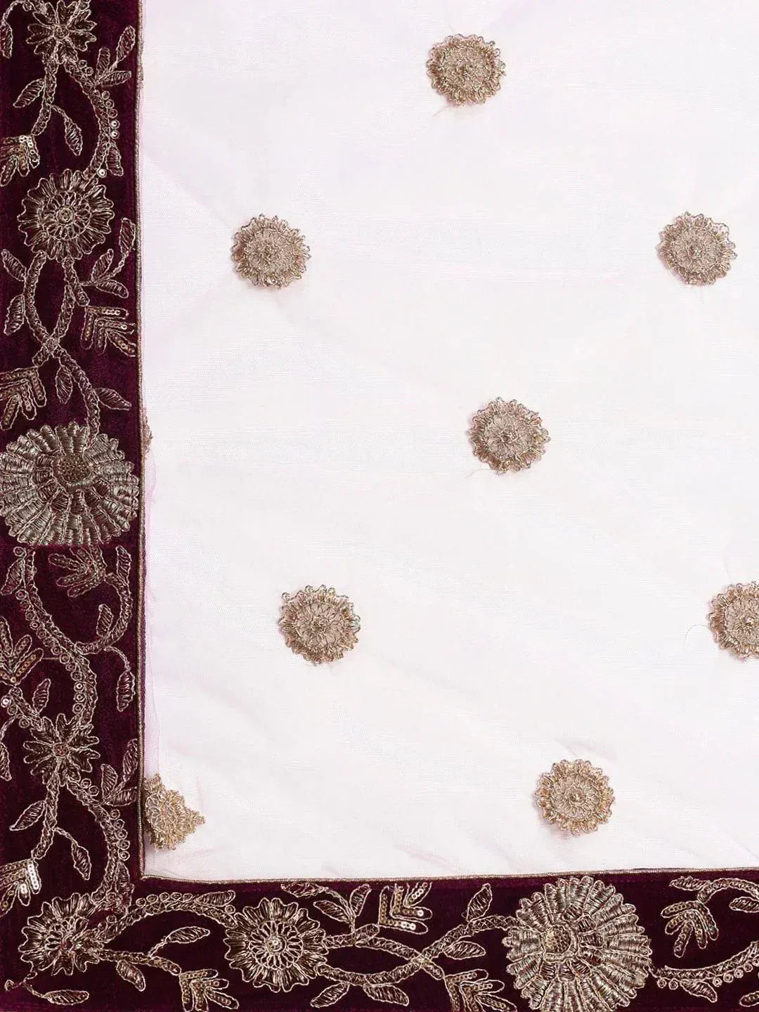 White ethnic saree with maroon velvet border and gold floral embroidery, perfect for Indian weddings