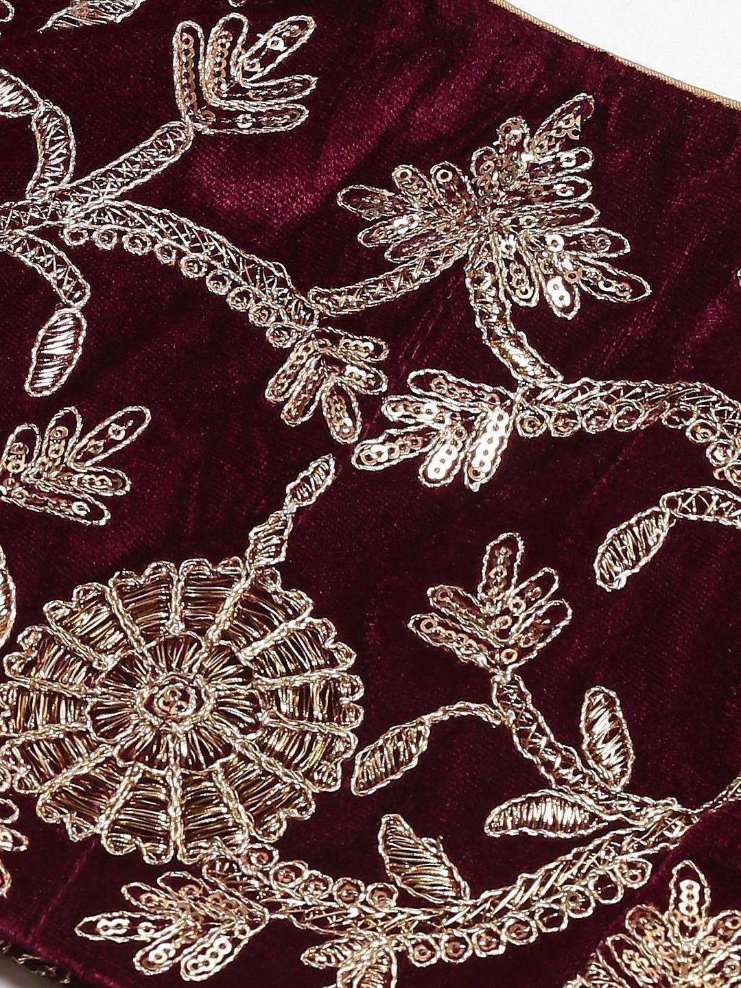 Rich maroon velvet with intricate gold floral embroidery for ethnic wear