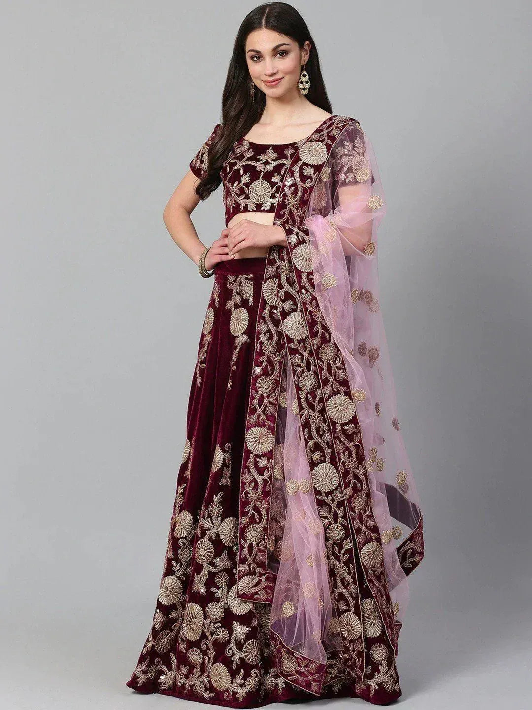 Maroon velvet lehenga choli with gold floral embroidery and sheer pink dupatta, Indian ethnic wear